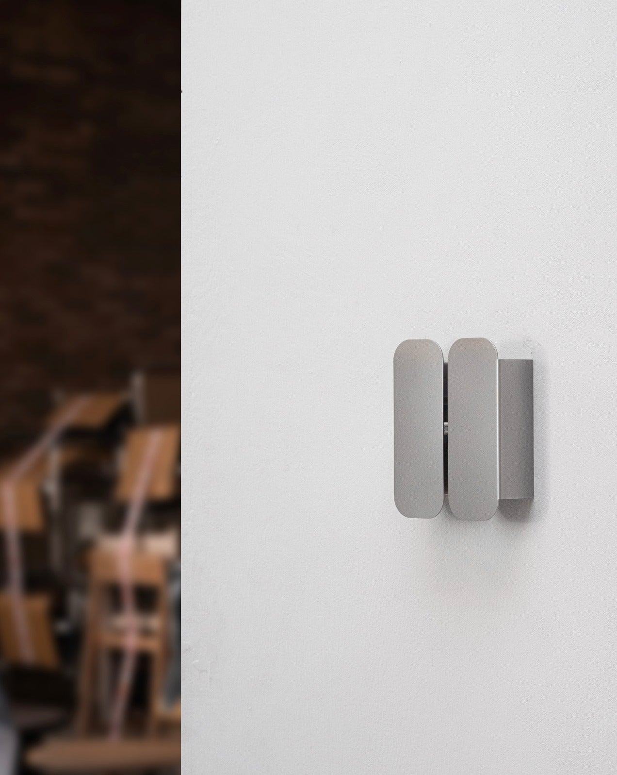 Wall Lamp - 1.0 - Double -Stainless Steel — close-up on matte stainless steel finish