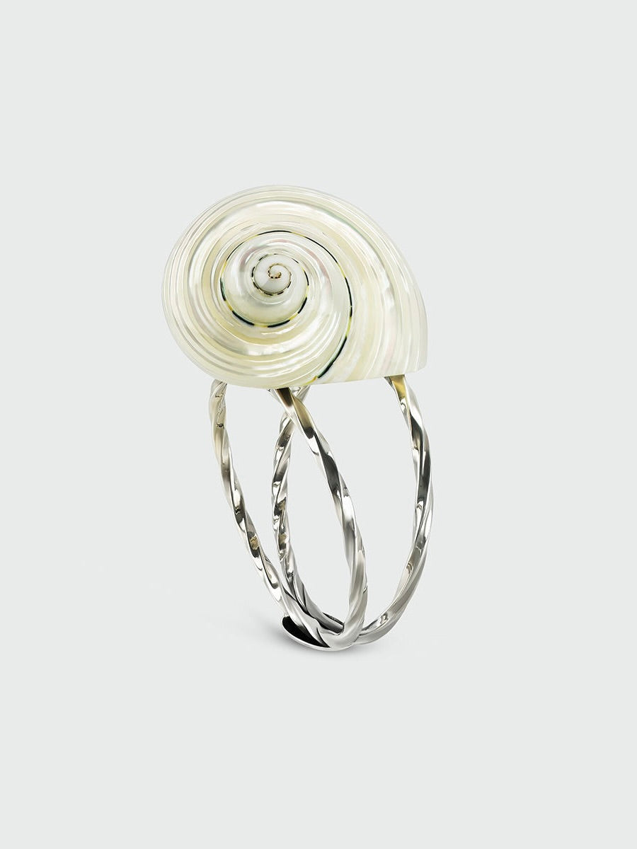 The Tavares 1922 Set of 2 Napkin Rings features elegant silver spirals, reminiscent of shell shapes, beautifully displayed on a light gray background.