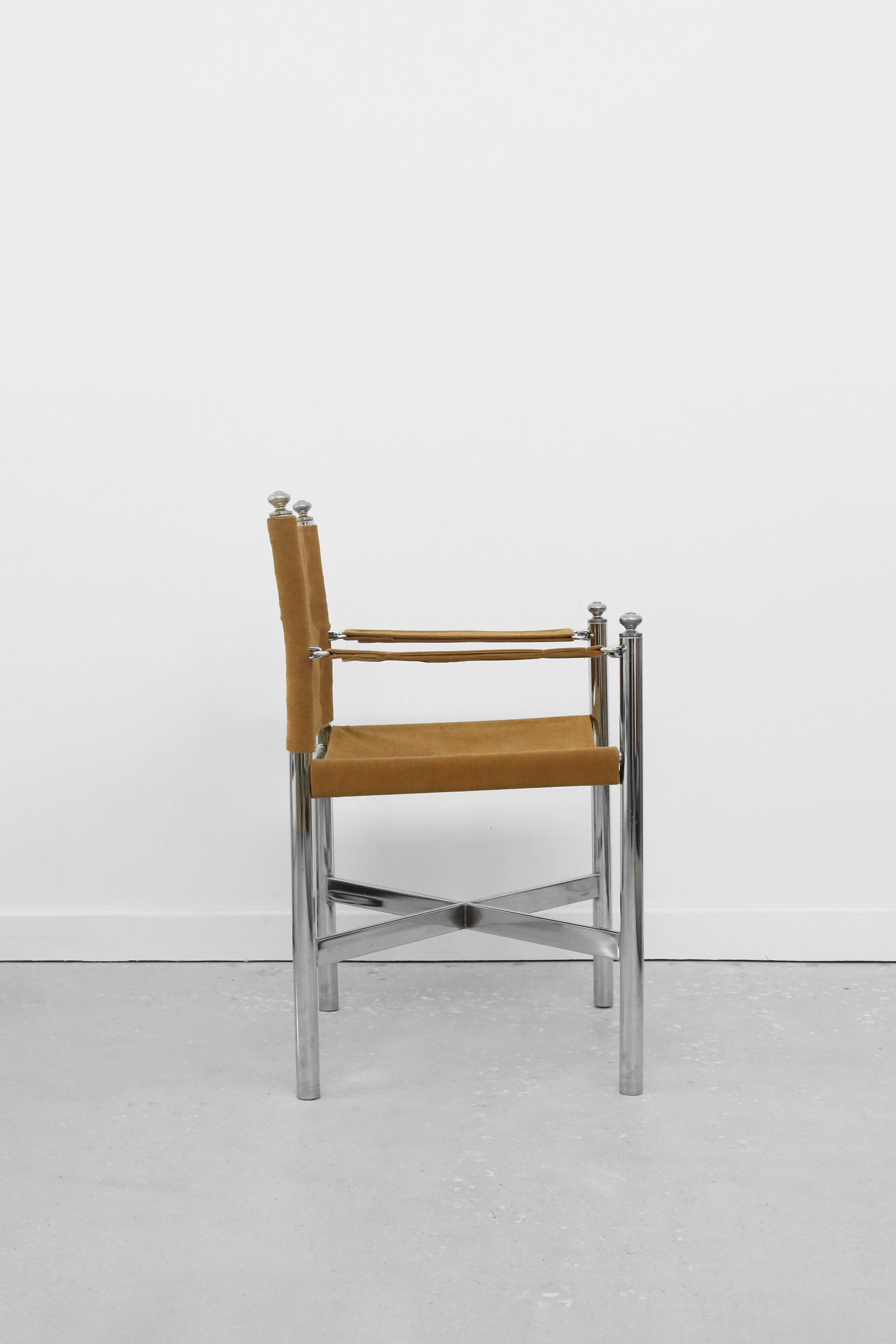 Chrome and Corduroy Arm Chair — side angle