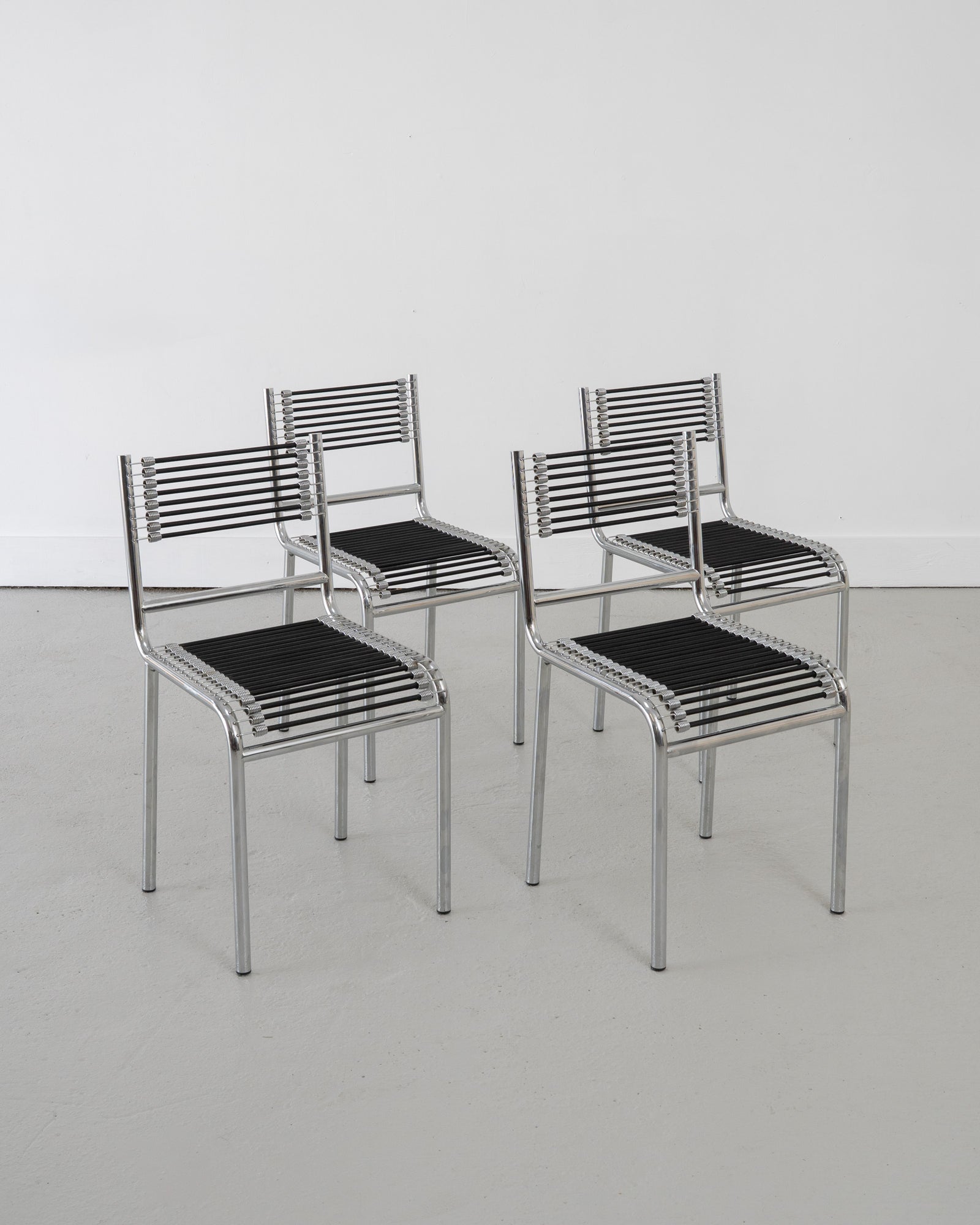 Four Sandows Chairs by René Herbst, c.1980 by Tom Bogle | The Oblist
