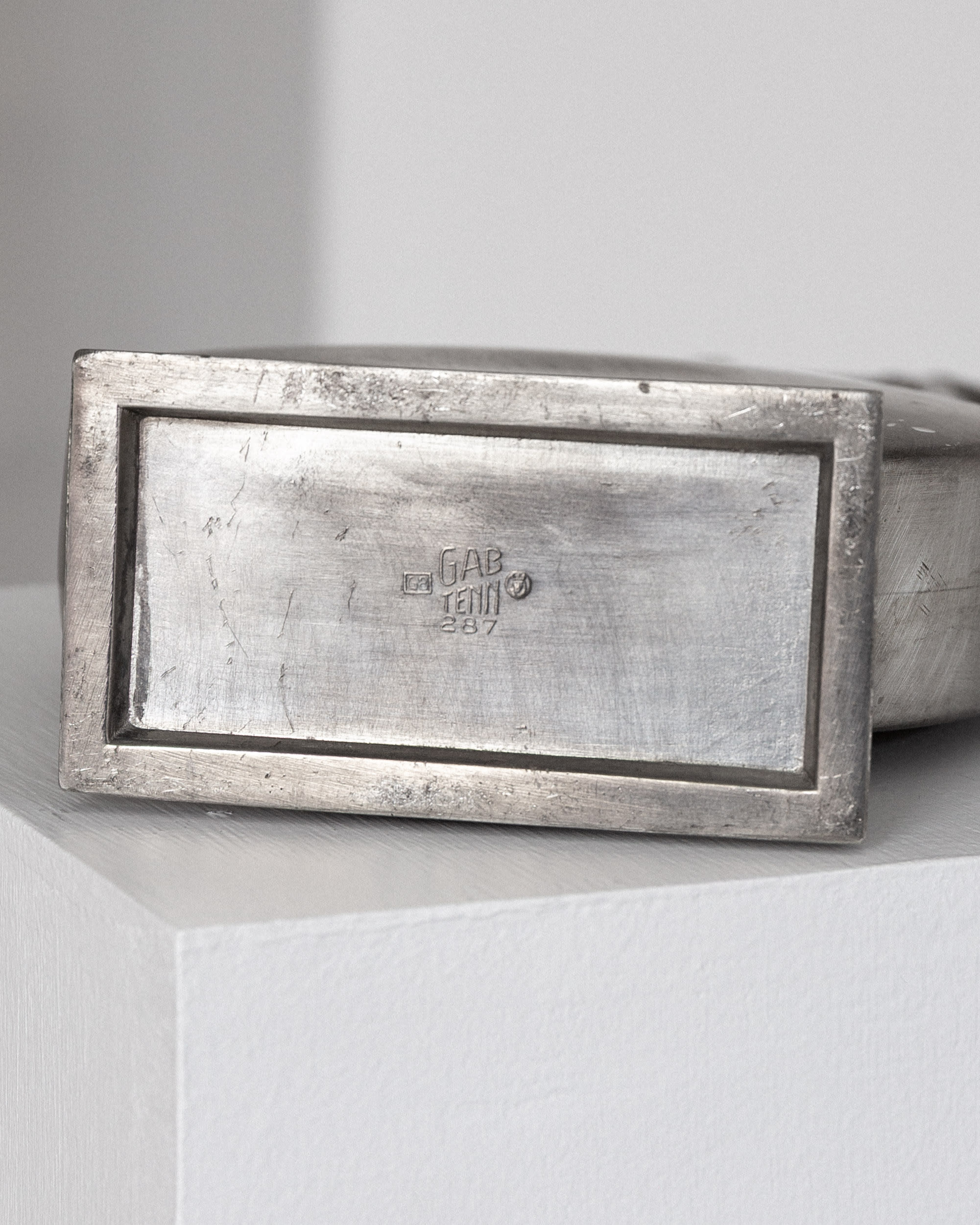 Sculptural Art Deco Pewter Pitcher by GAB, Sweden, 1930s — close-up of textured pewter base