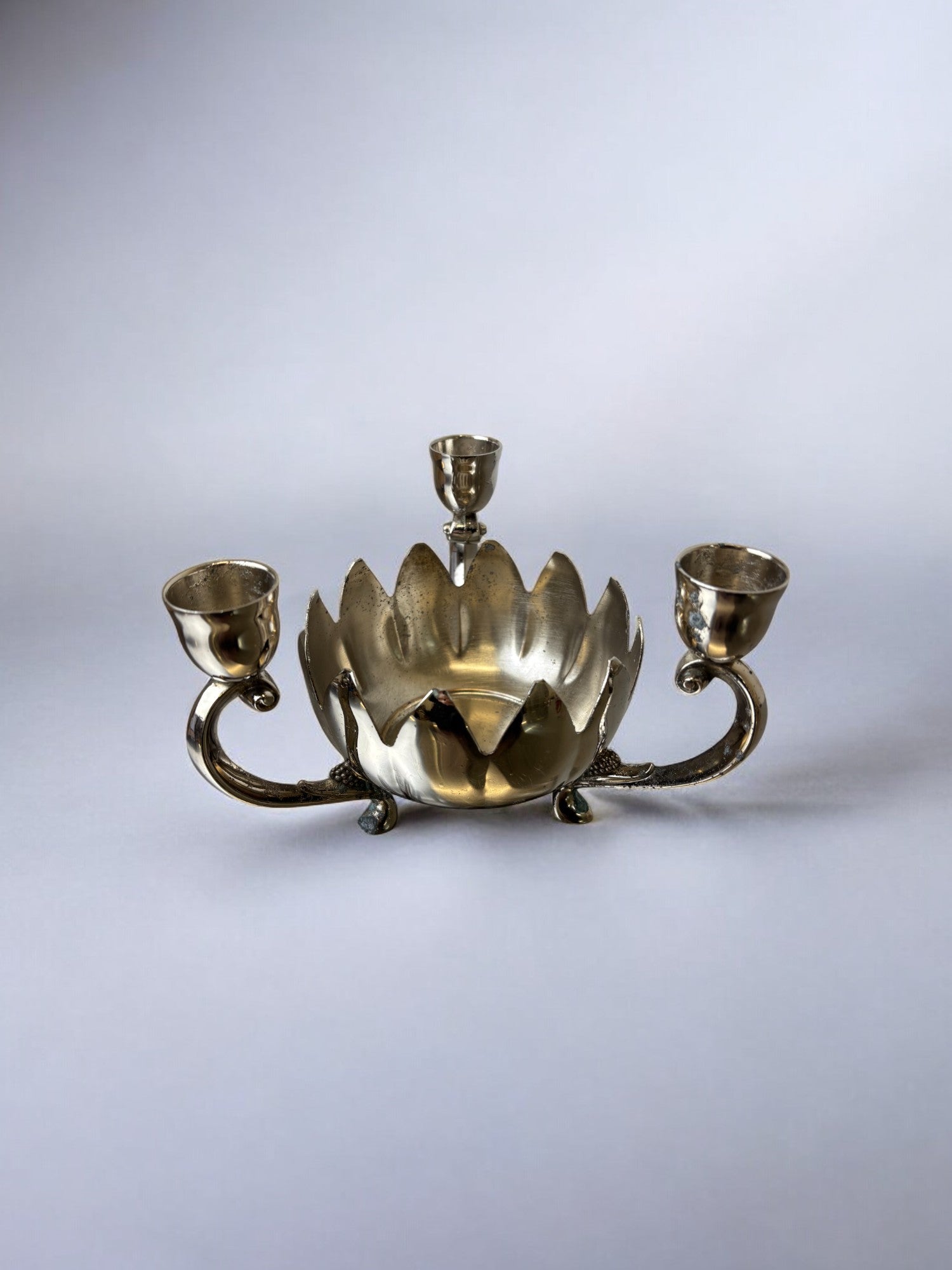 Art deco waterlily Candelholders, France, 1960's — side angle showing polished metal finish