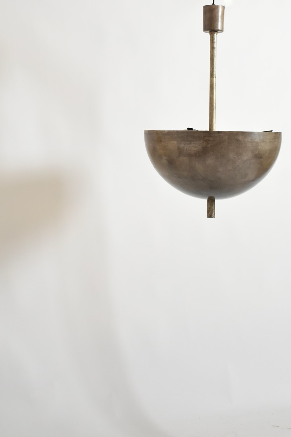 Modernist iron ceiling lamp, 1920s — lifestyle setting