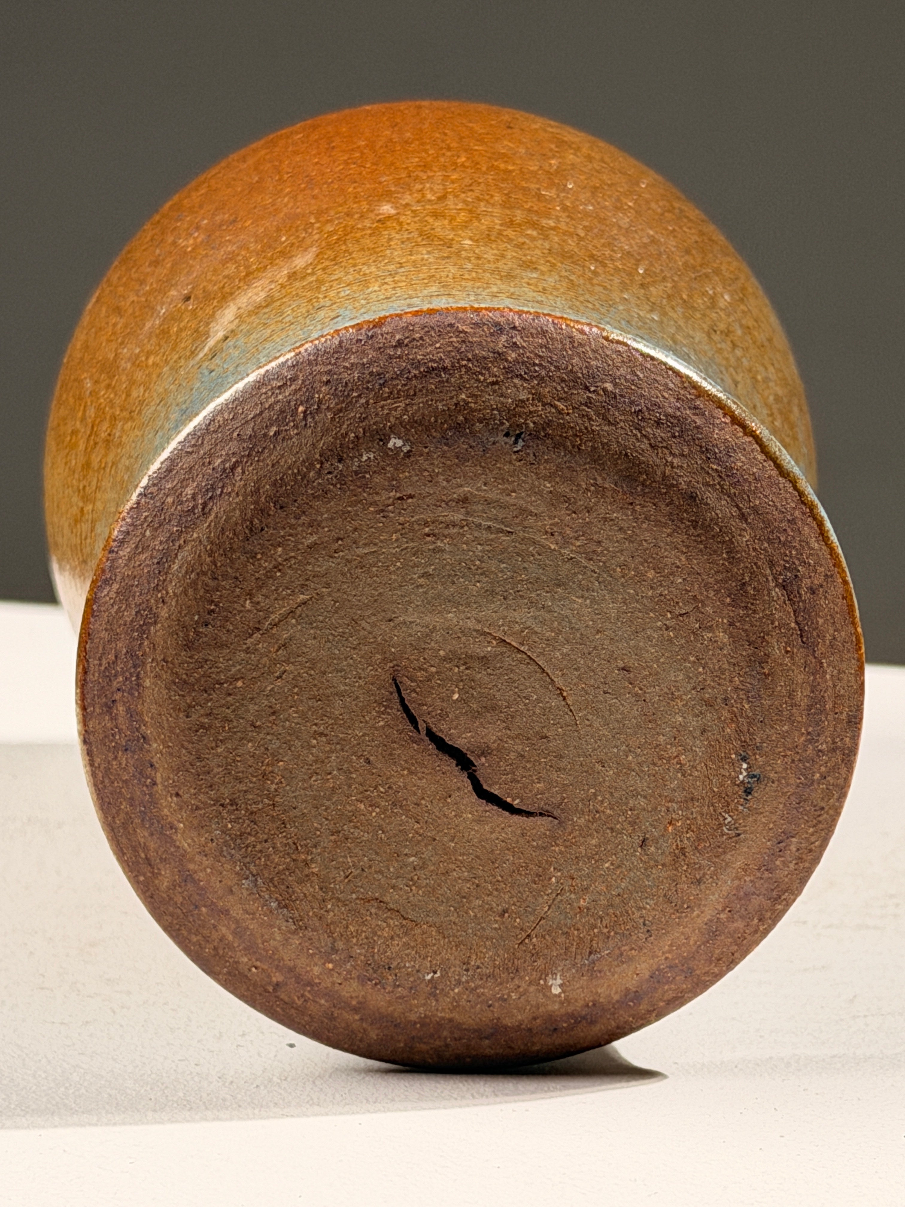 Brown and blue glazed stoneware vase, circa 1970 — lifestyle setting