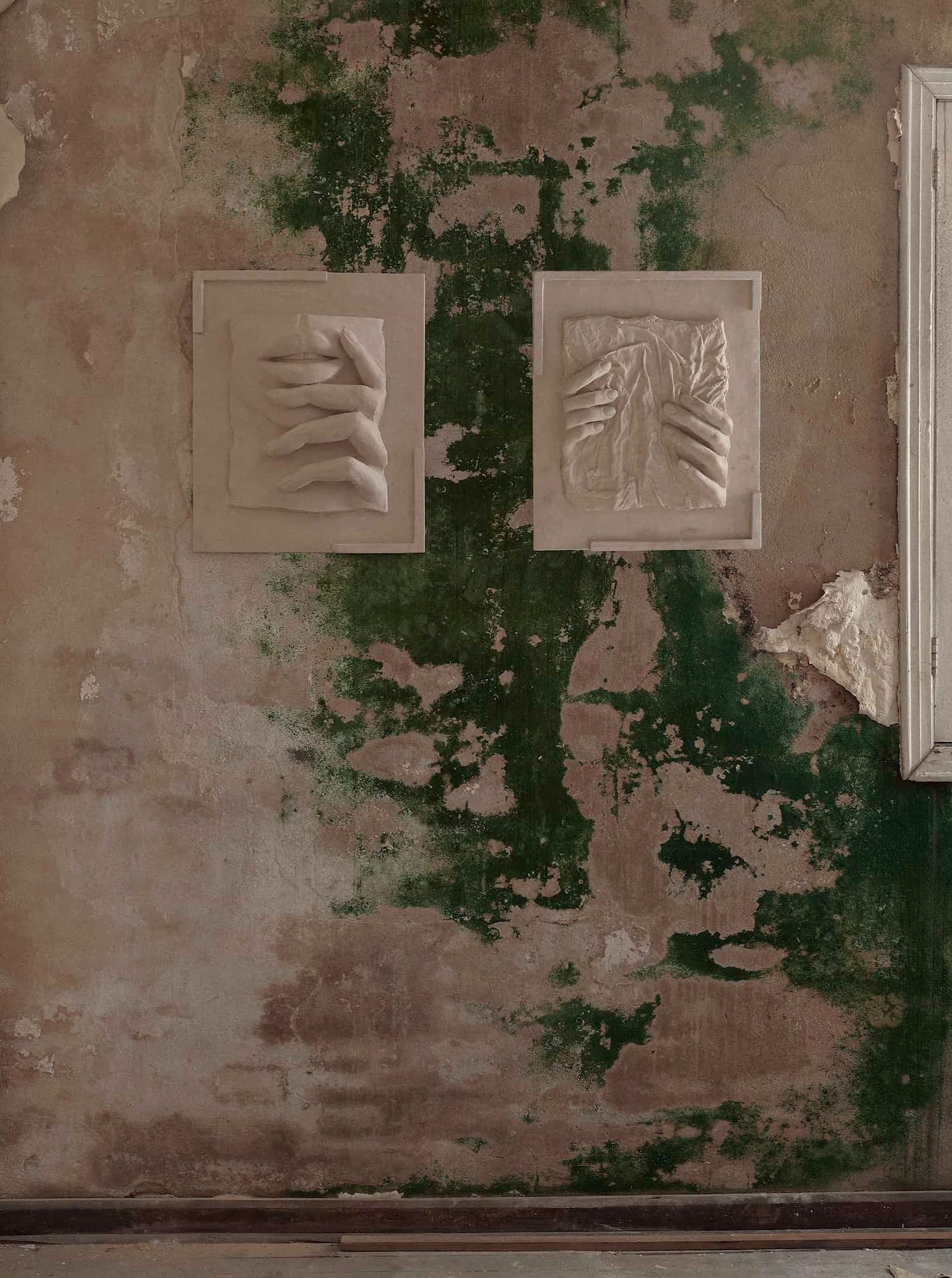 Contemporary Abstract Wall Sculpture in Resin and Stone – No. 22 by Marcela Cure — displayed on textured wall with peeling pa