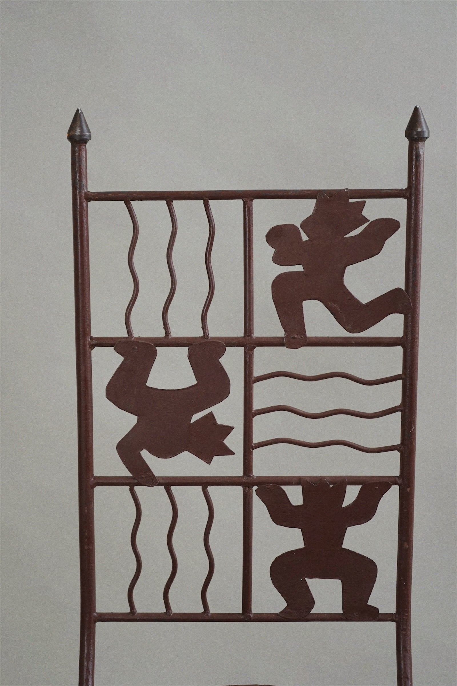 Iron Chair with Stylised Figures c.1980 — lifestyle setting