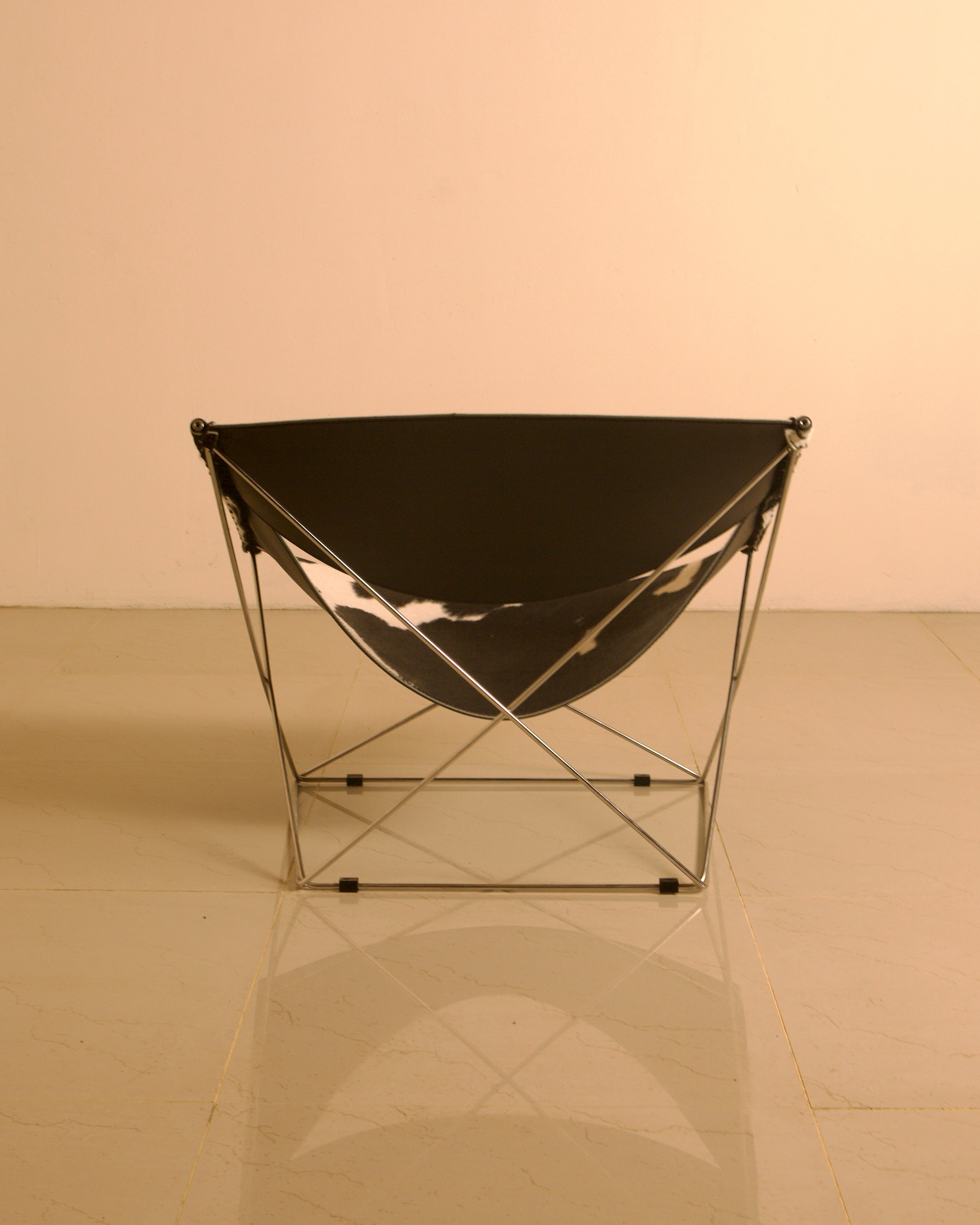 F675 "Butterfly" Cowhide Armchair by Pierre Paulin for Artifort 00's — back view showing cowhide and metal frame