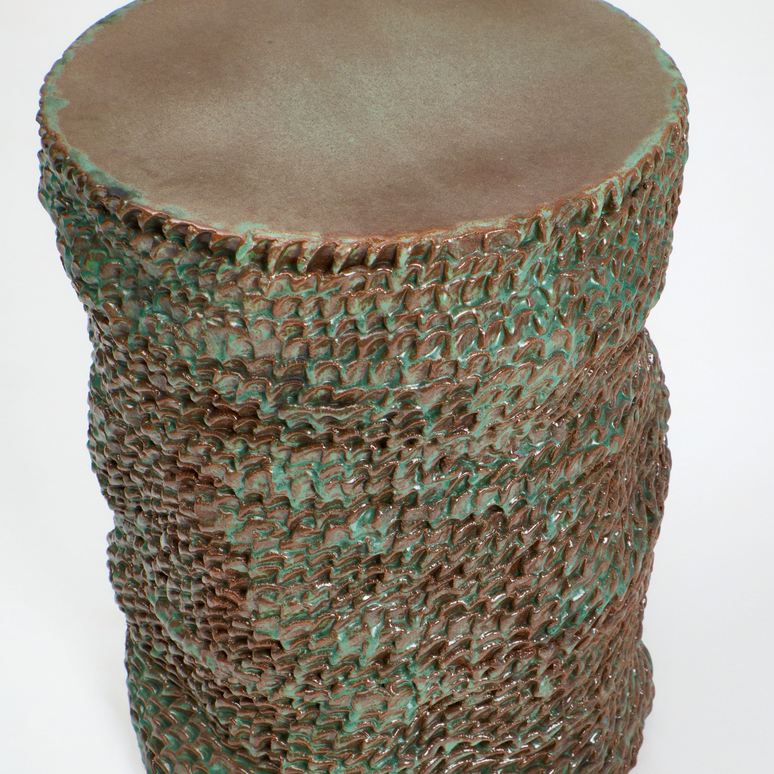Casa Ceramic Side Table — top view of textured green ceramic surface