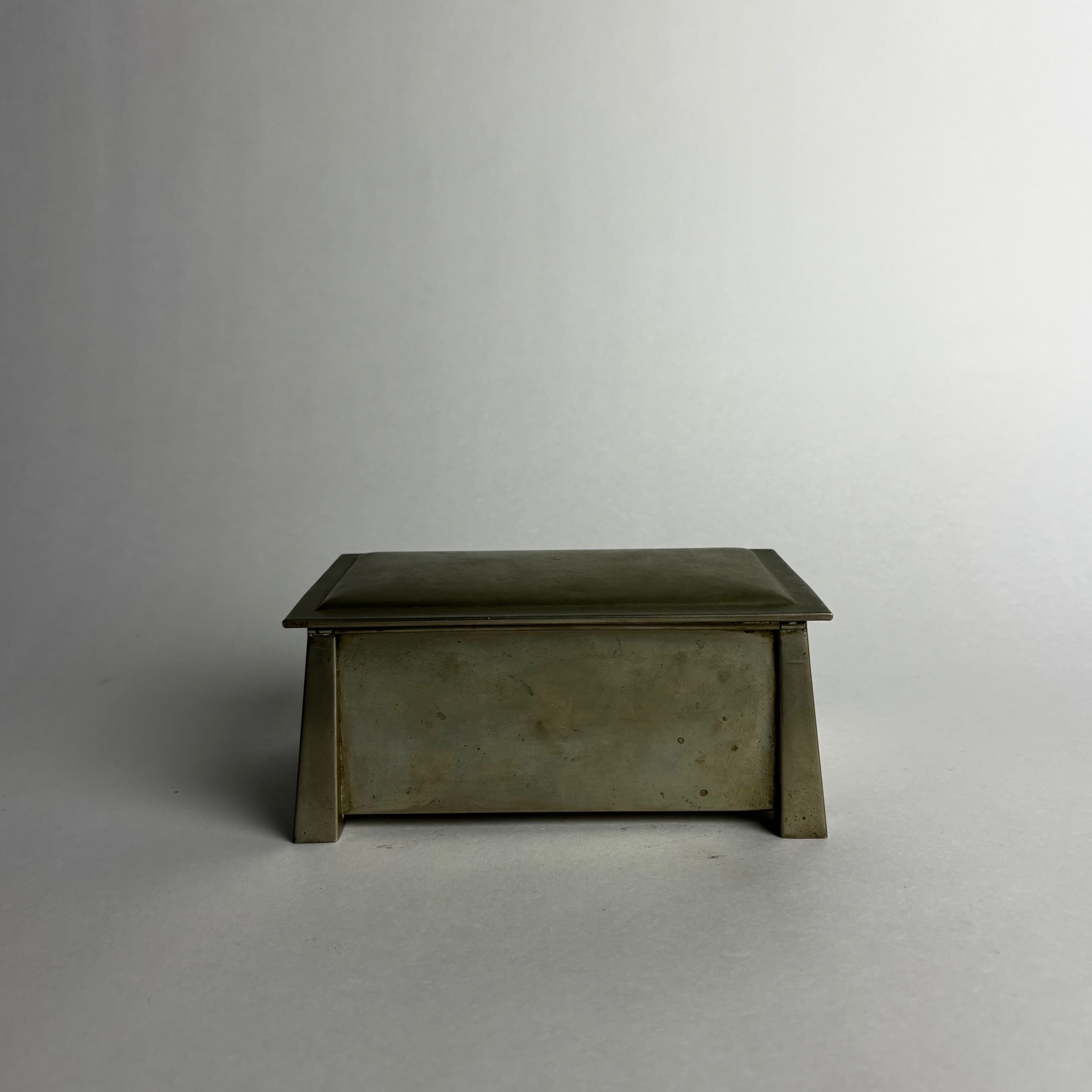 Vintage Boxes in Nickel - Lidded Cigarette Collection — close-up