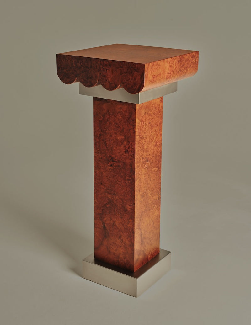 Dione Pedestal — close-up of warm wood grain finish
