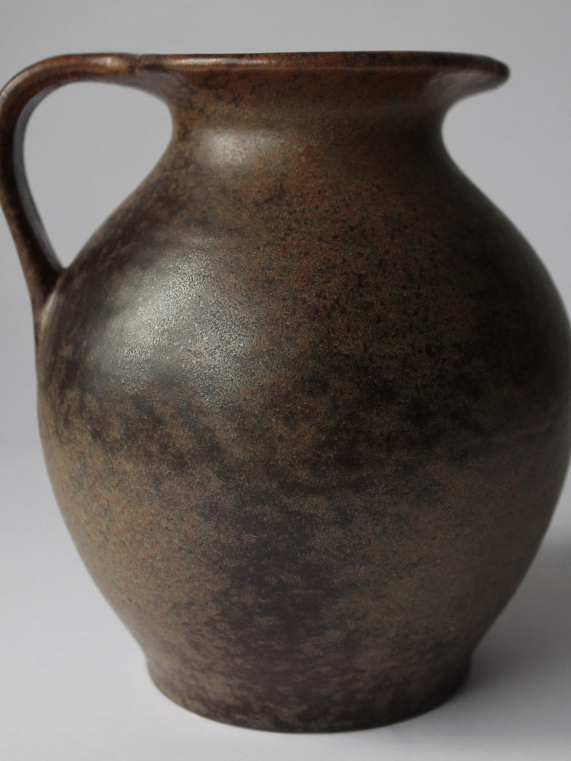 German Fat Lava brown ceramic jug with matte textured finish