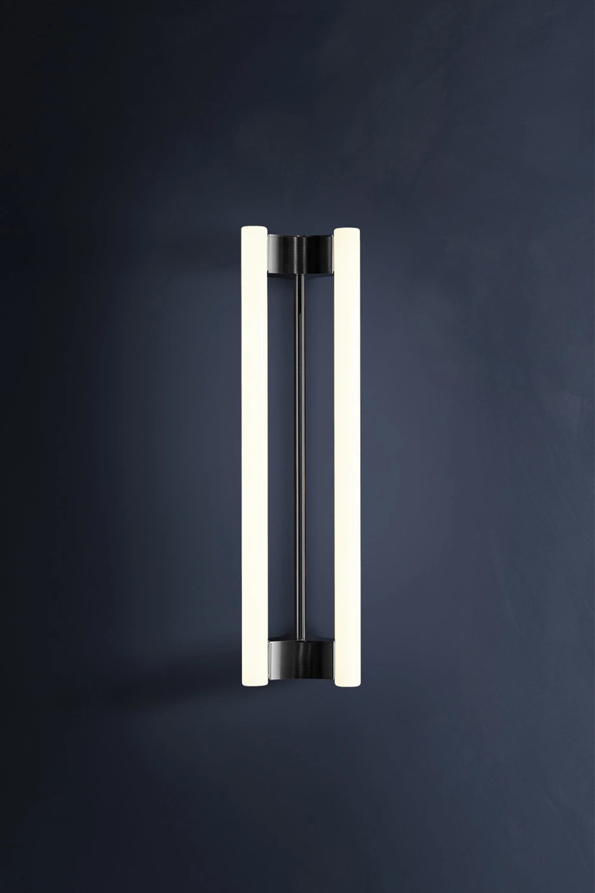 LIA WALL SCONCE 50 — side angle showing modern black and white design