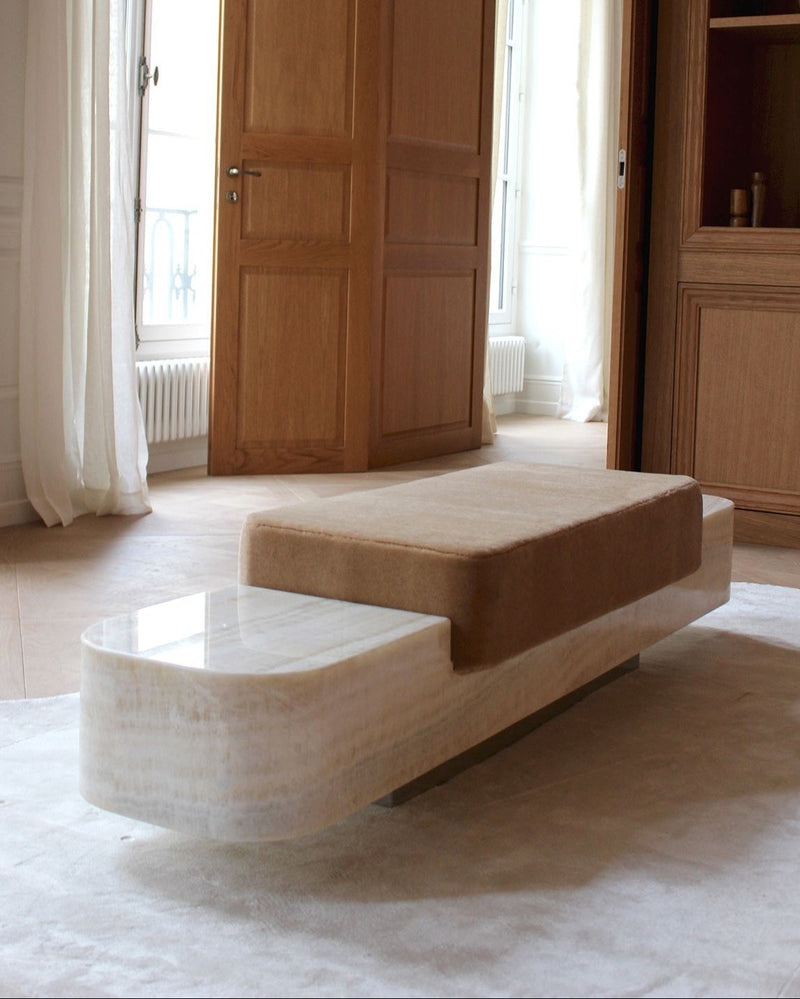 Ran Ivory Onyx Bench — close-up of onyx surface with beige cushion