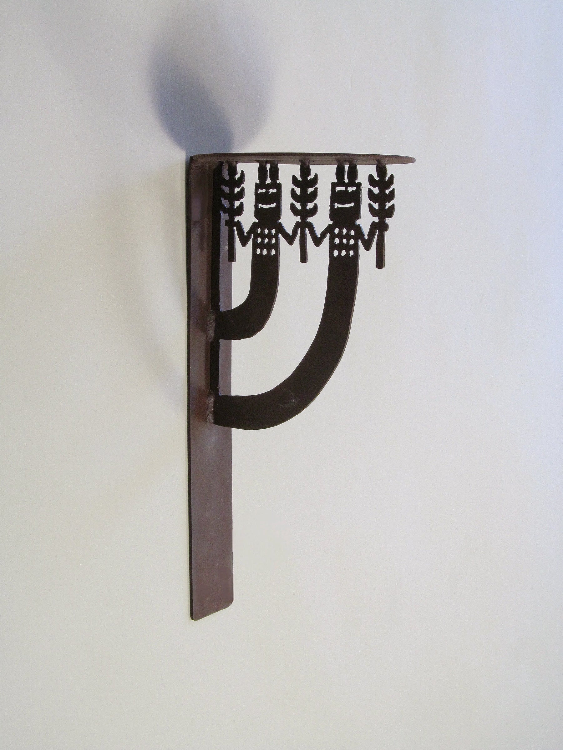 Rosemary Pozzi Franzetti Wall Mounted Shelves — side angle showing metal bracket design