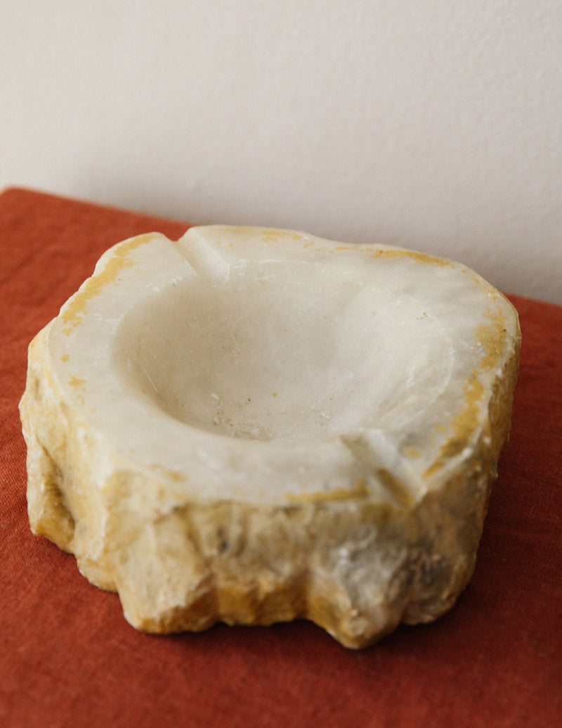 Handcrafted alabaster ashtray showing smooth interior bowl detail