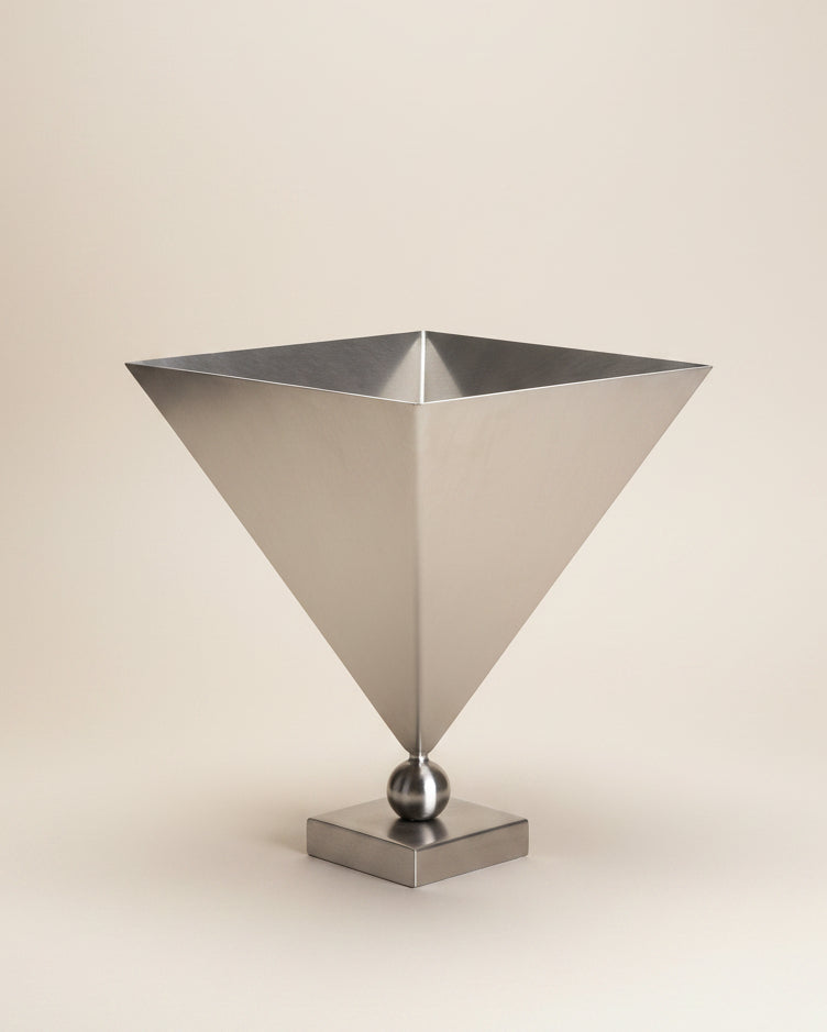 Stainless Steel 'Vasen' Vase — close-up of polished metallic surface