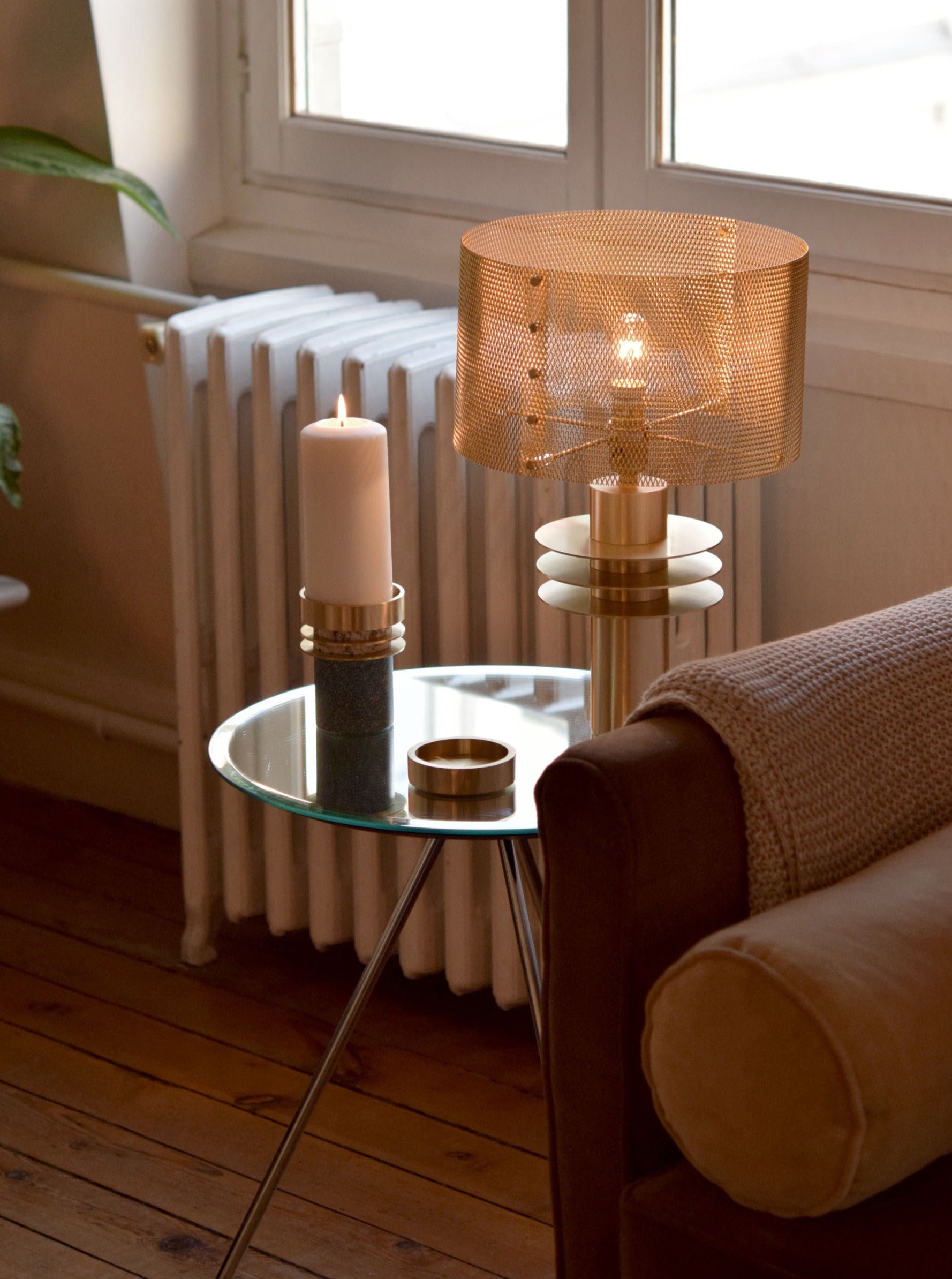 Black Swan Table Lamp — side angle on glass side table