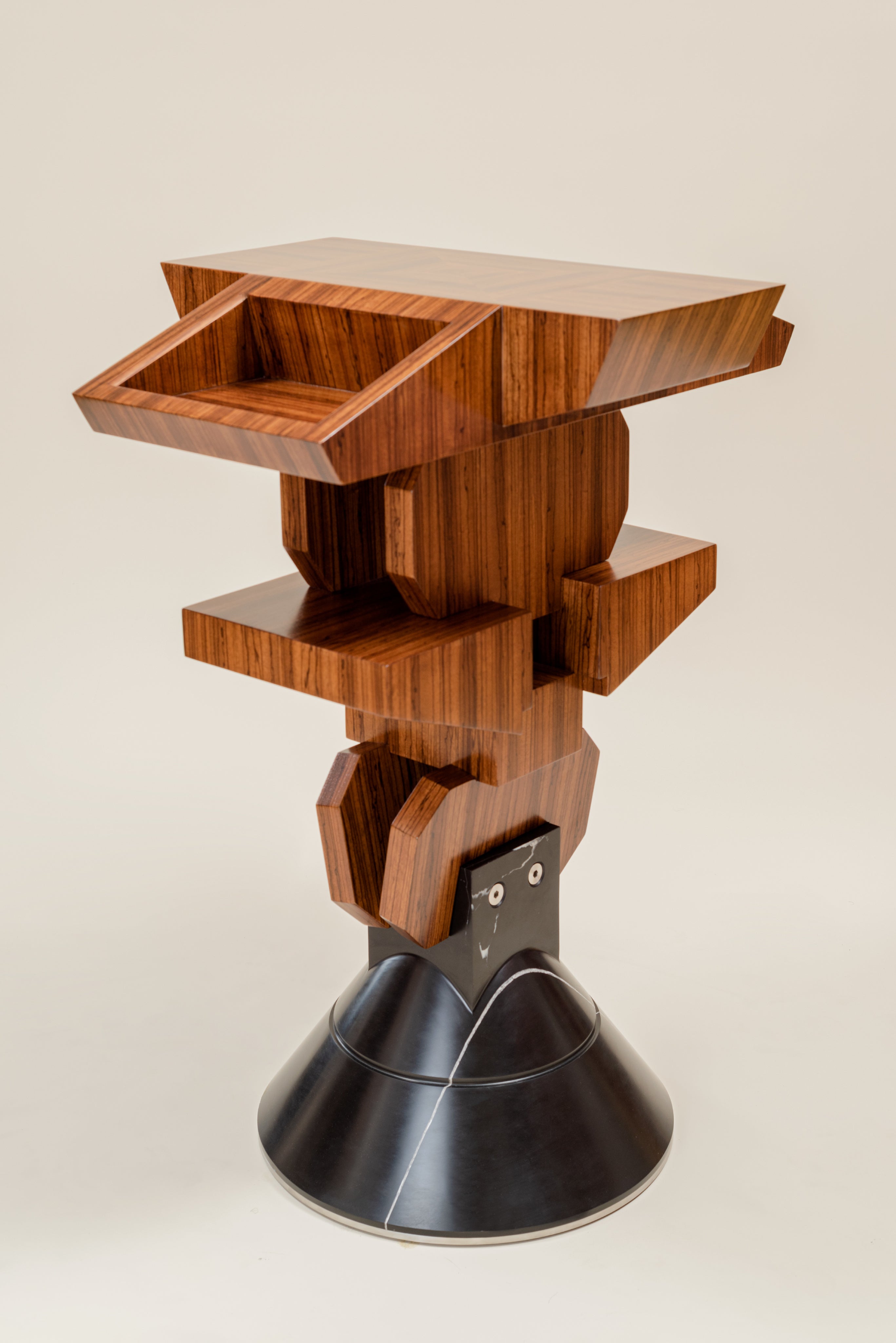 Pyramiss Pedestal Table — top view of layered wooden design