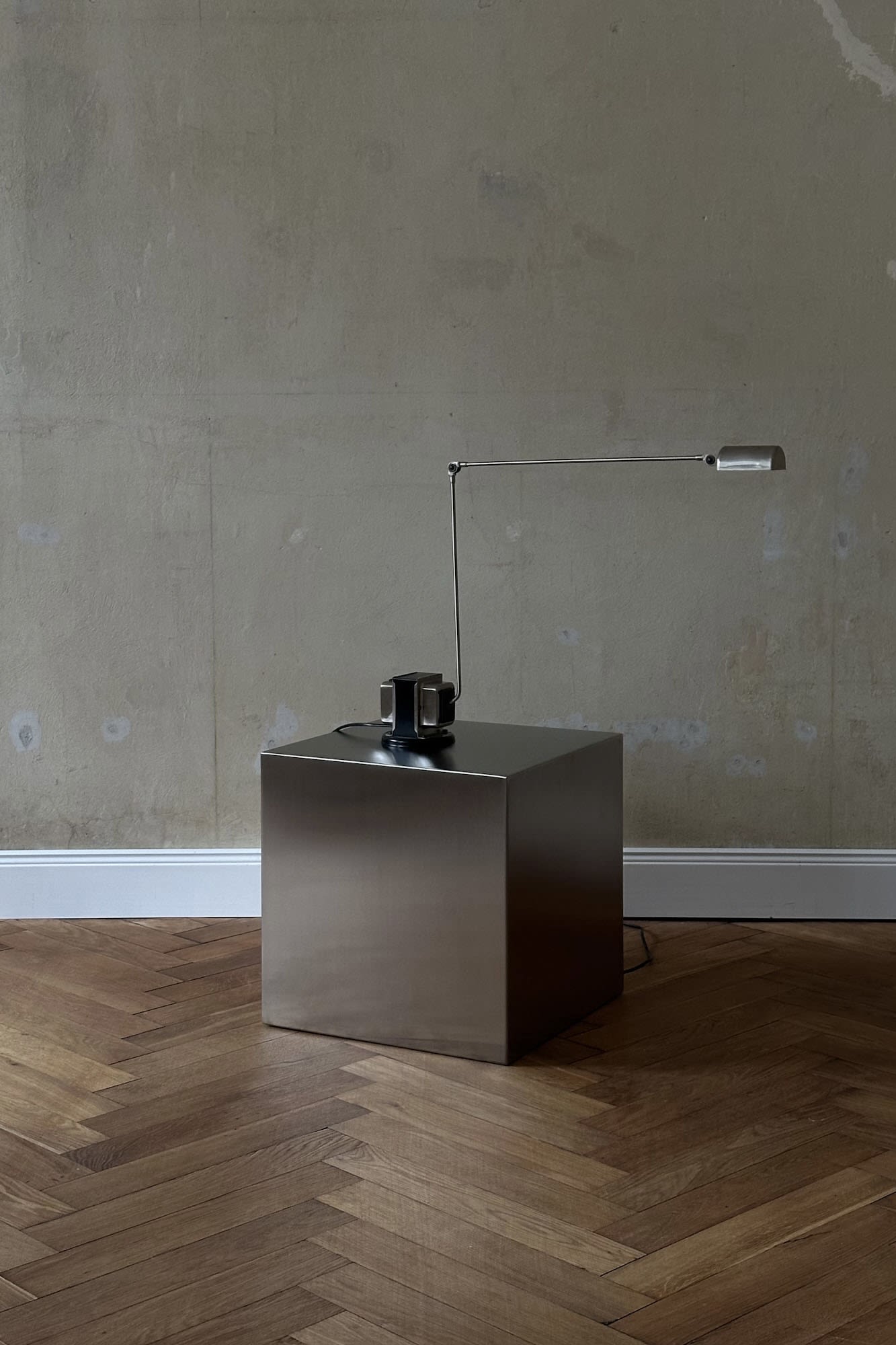 'NOSTALGIA' stainless steel cube — close-up