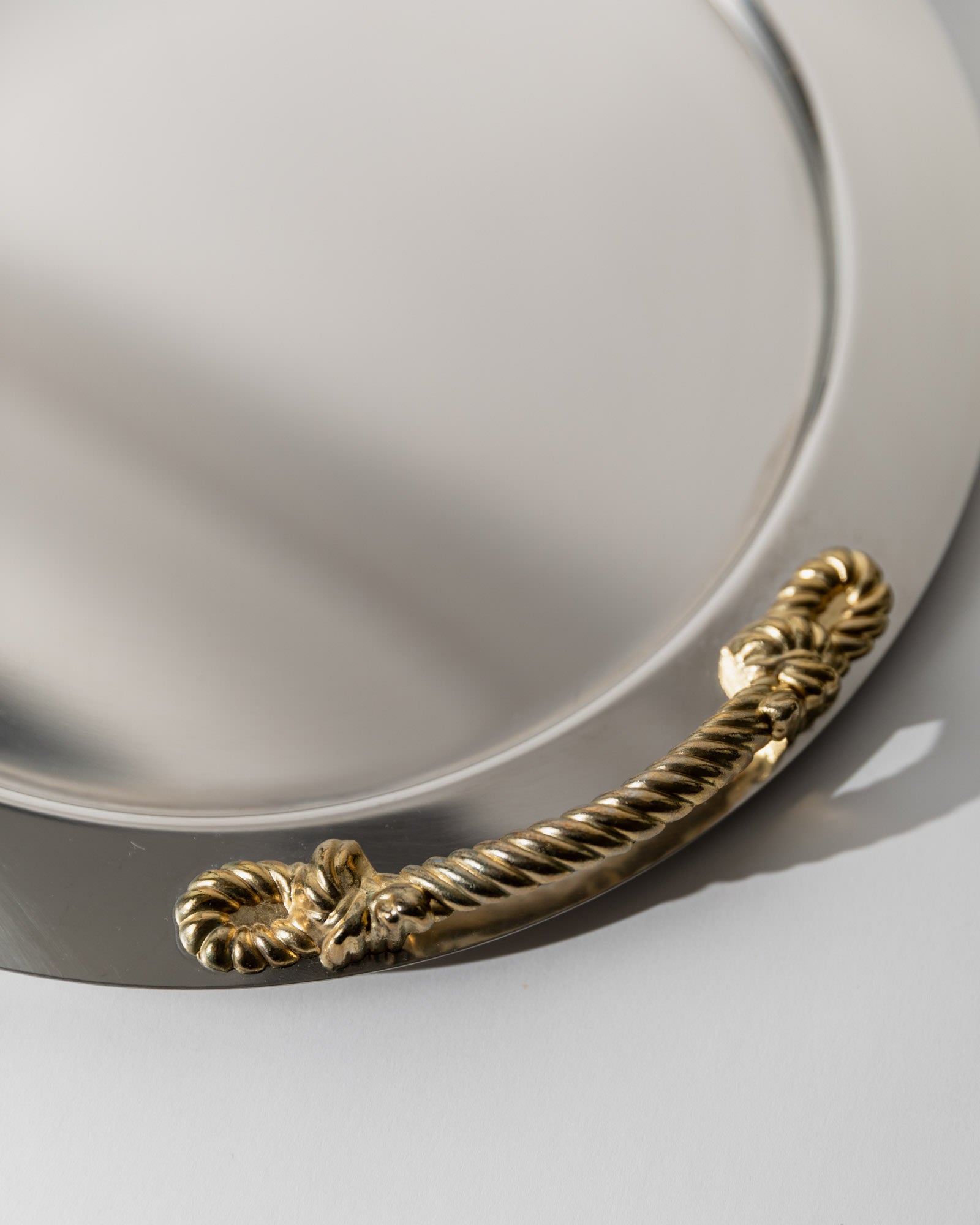 Vintage 1980s Stainless Steel Tray round, Gold Rope Handles by Inoxpran Italy — close-up of gold rope handle detail