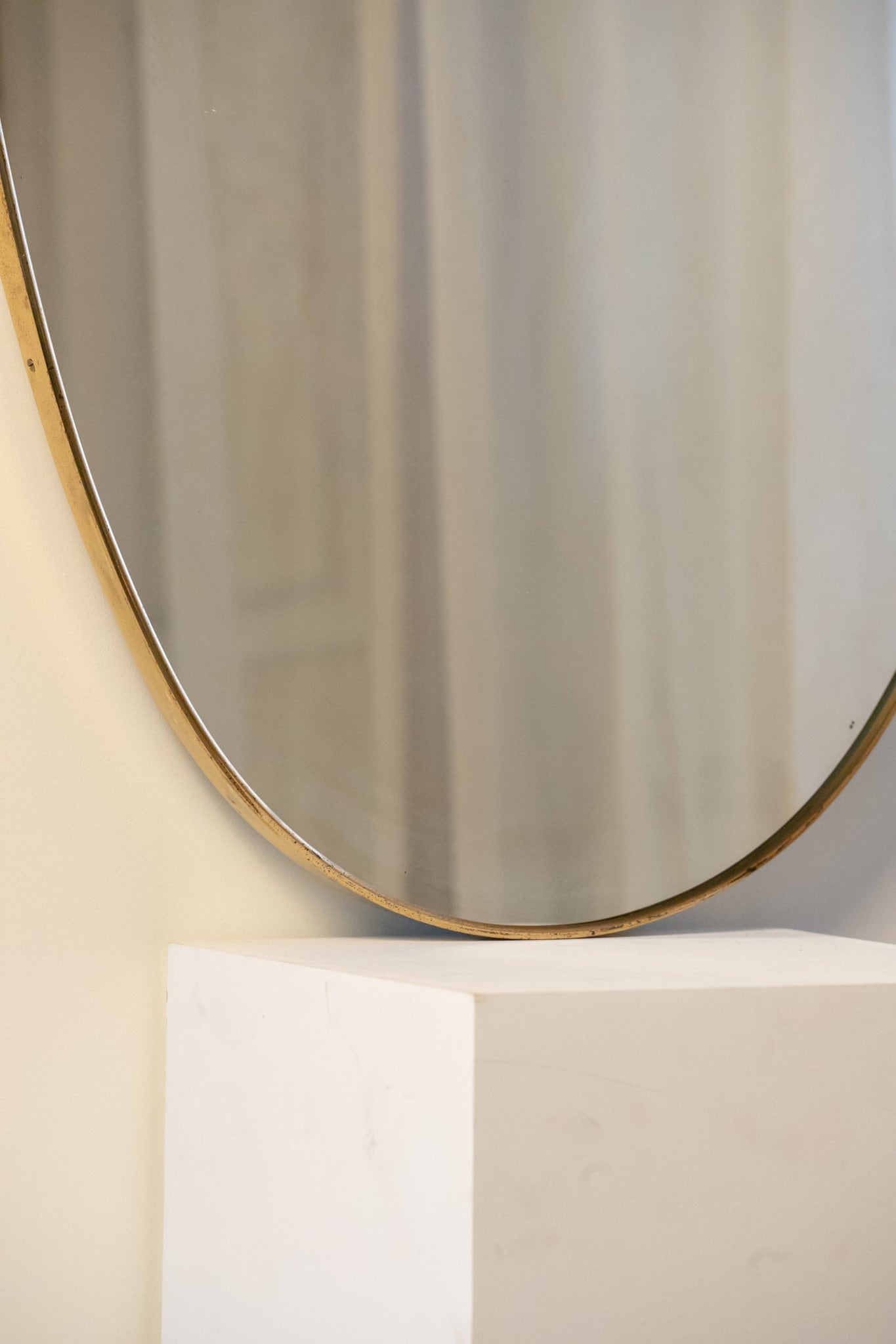 Large Midcentury Italian Brass Shield Mirror — back view showing brass edge detail