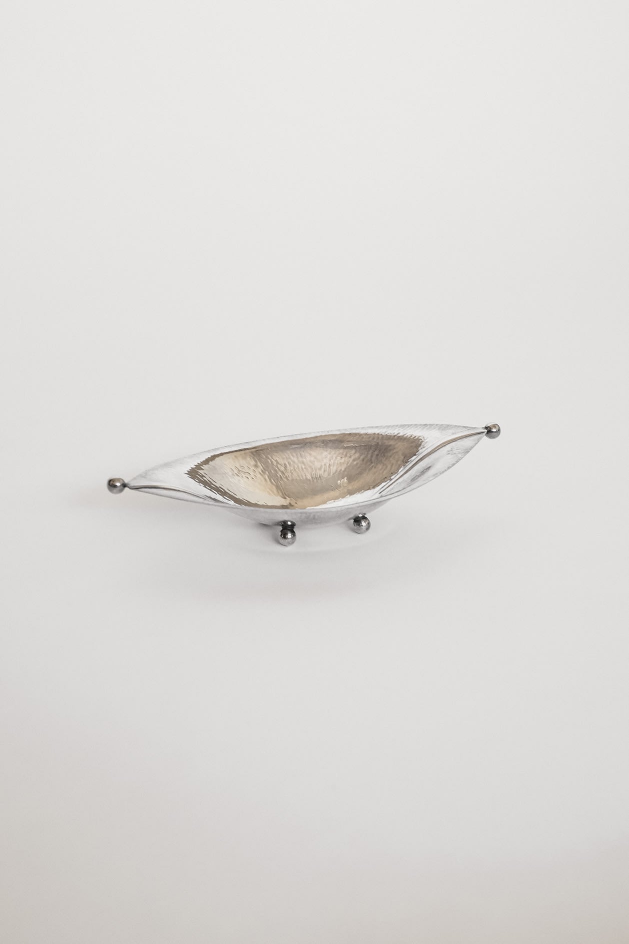 Vintage Silver-Plated Dish with Hammered Texture — lifestyle setting