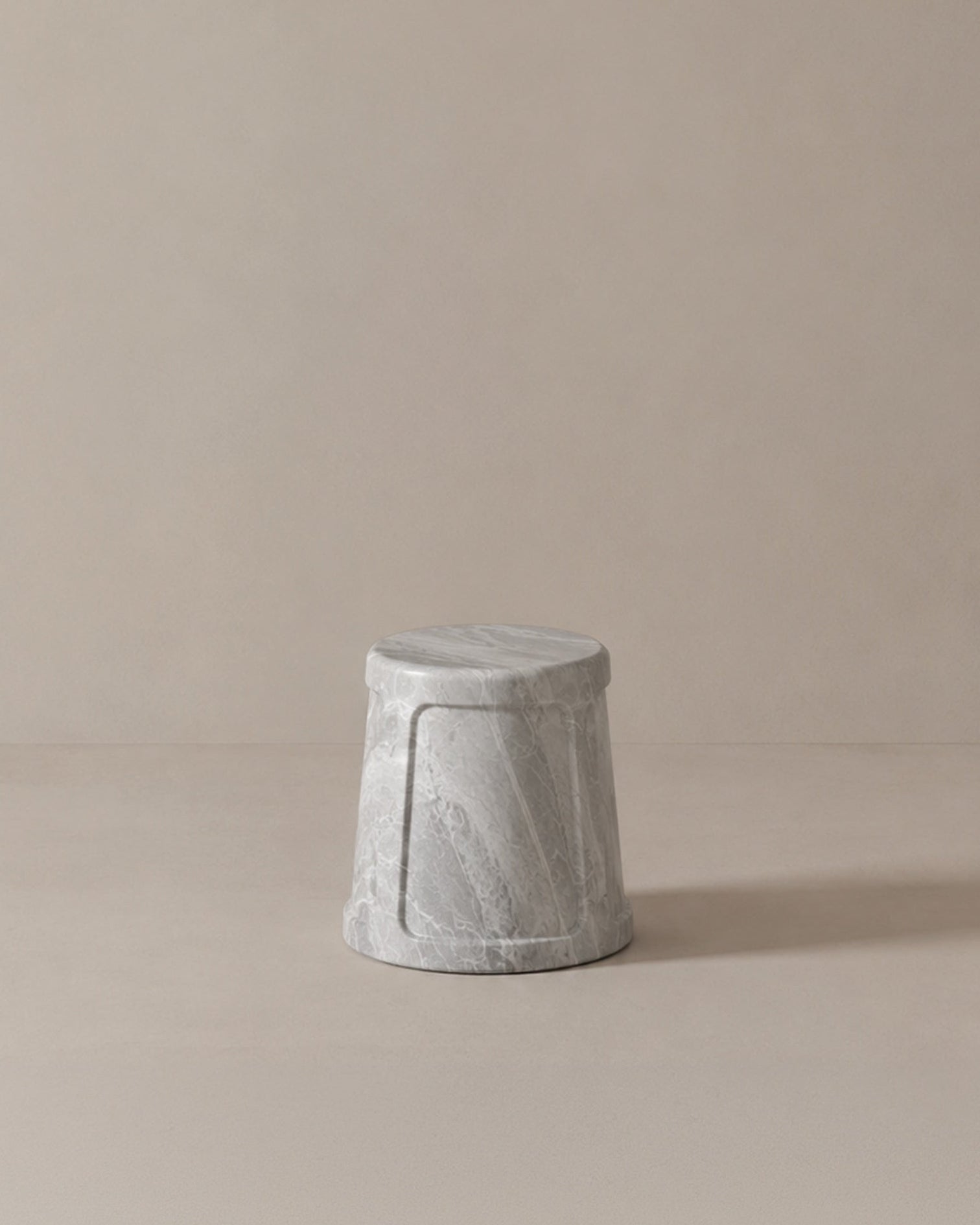Sculptural marble NITO Stool — lifestyle setting