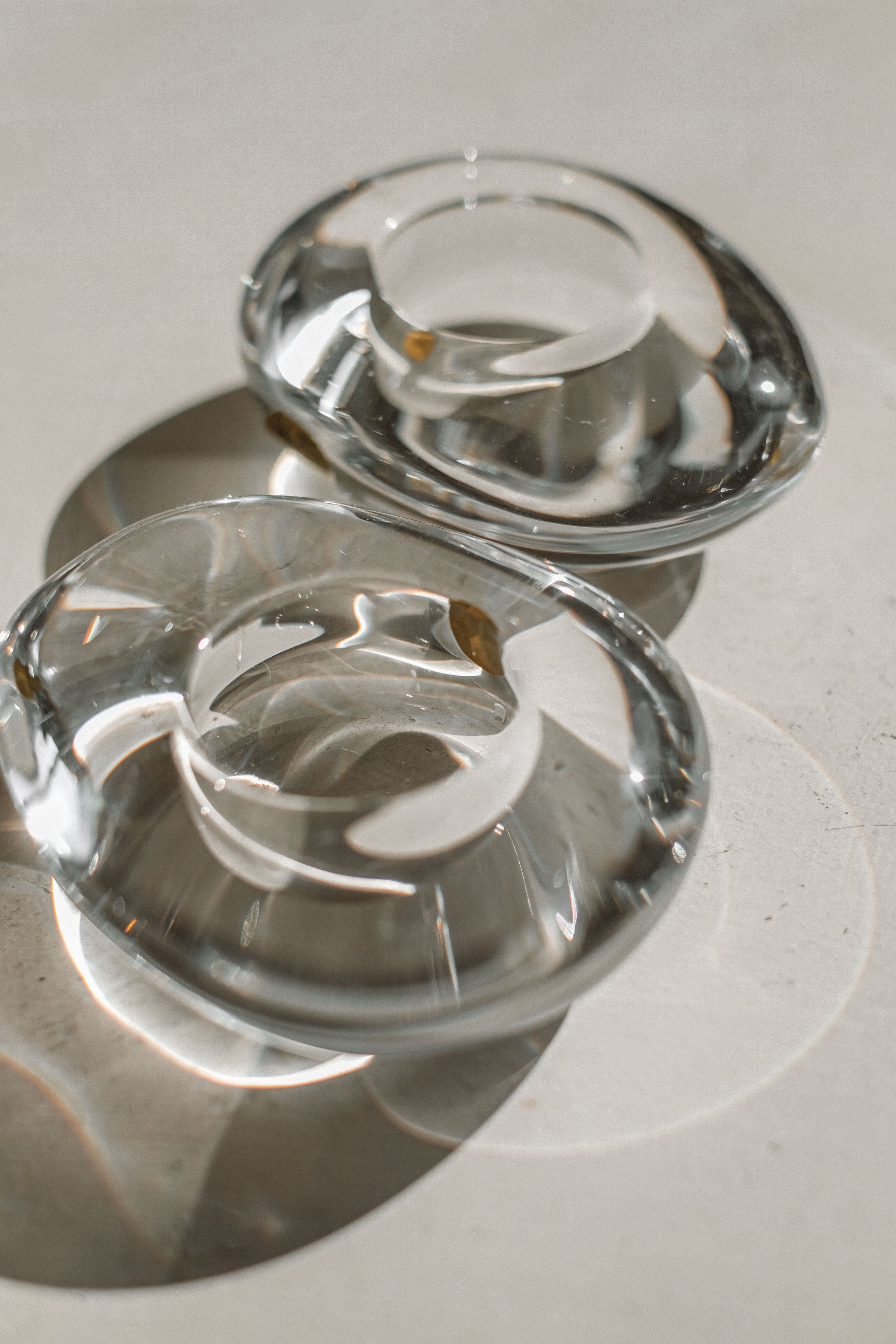 Clear crystal candleholders detail showing geometric cut patterns