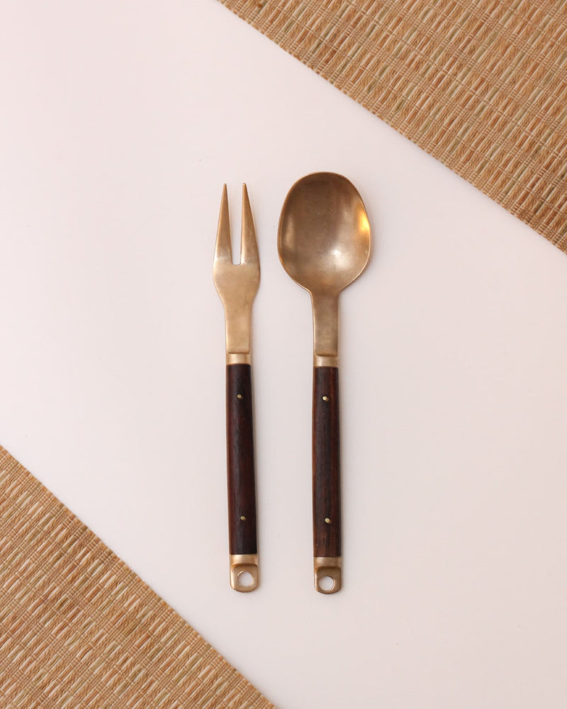 Serving pair by Carl Cohr — close-up of brass and wood details