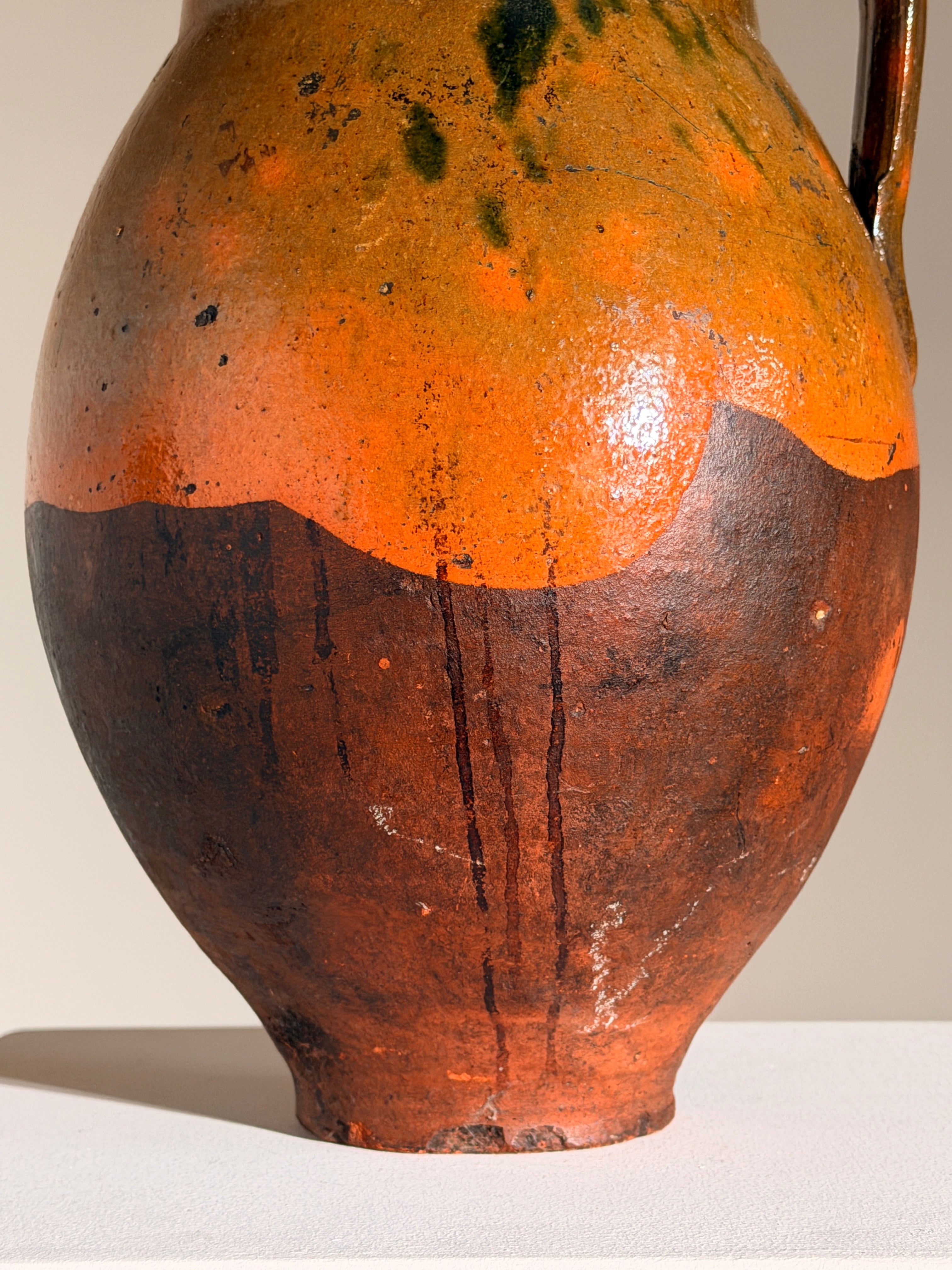 Ceramic Jar, French Folk Art, late 19th century — close-up of textured orange and black surface