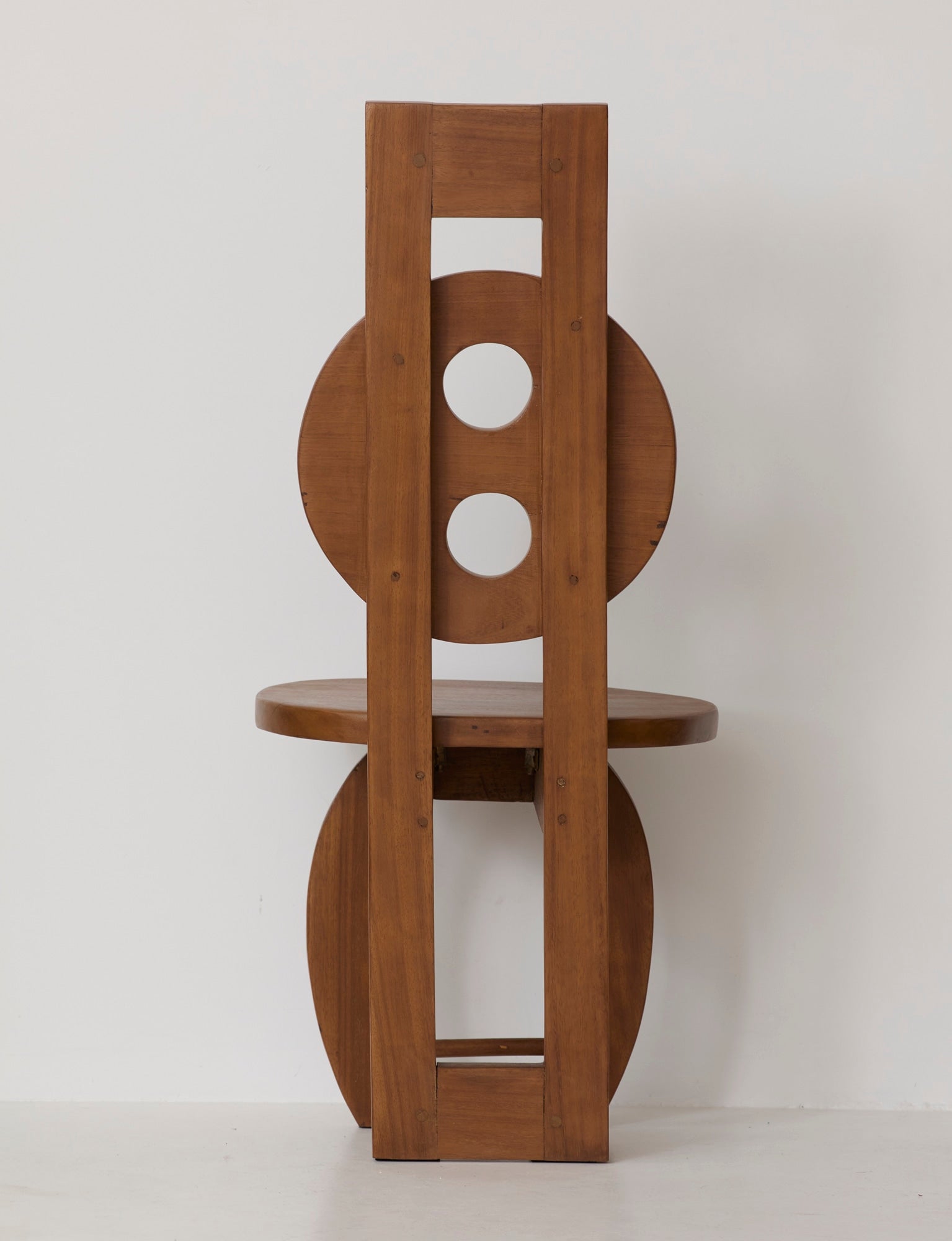 Heavy Sculptural Artisanal Chair in Solid Exotic Wood — side angle