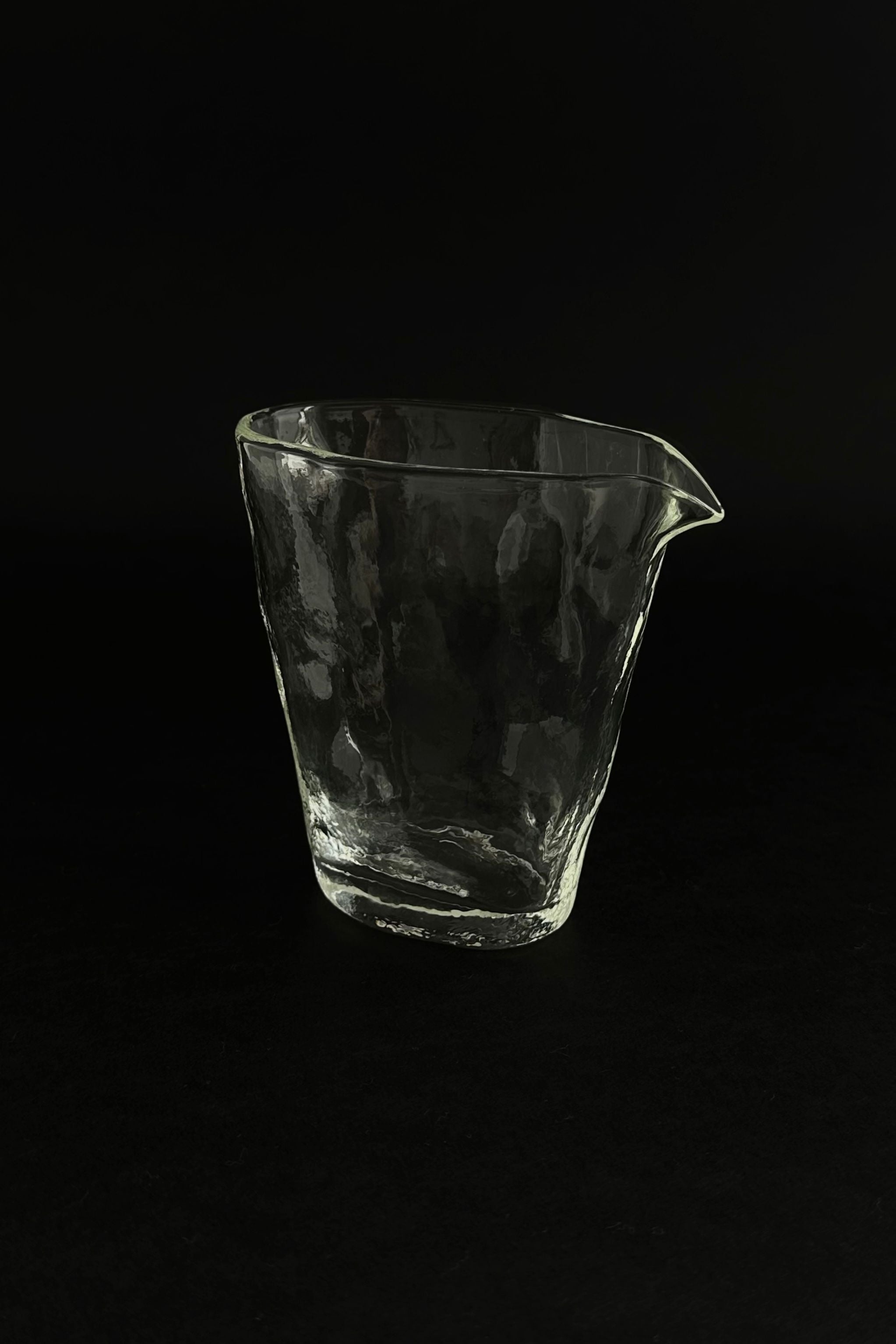 ELYSIUM' small glass pitcher — top view on black background