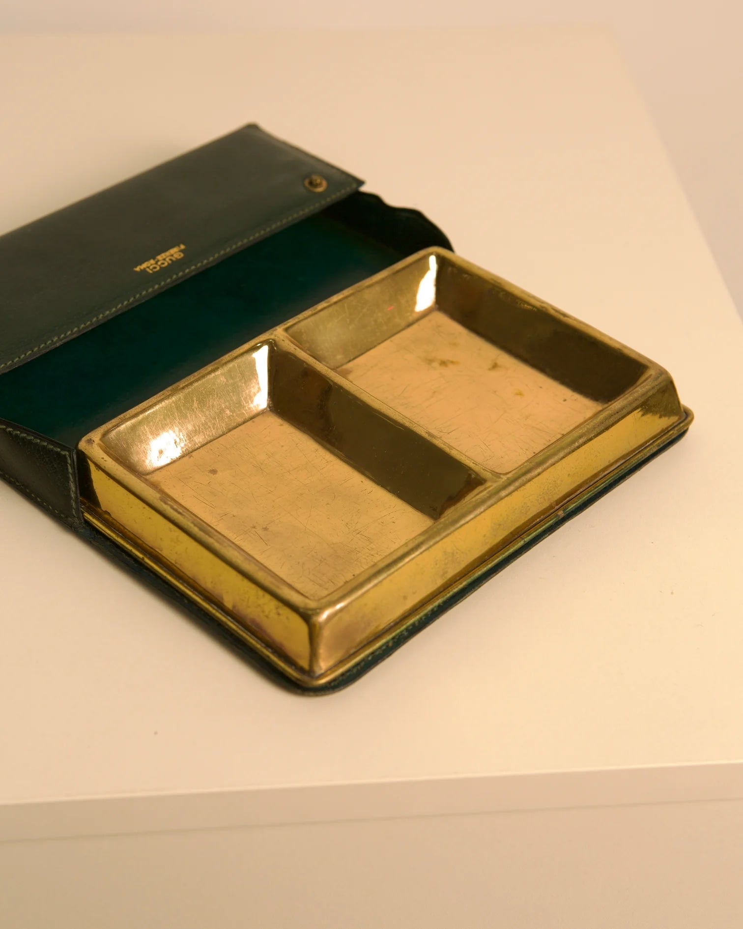 Gucci vintage leather vide-poche with brass compartments open view
