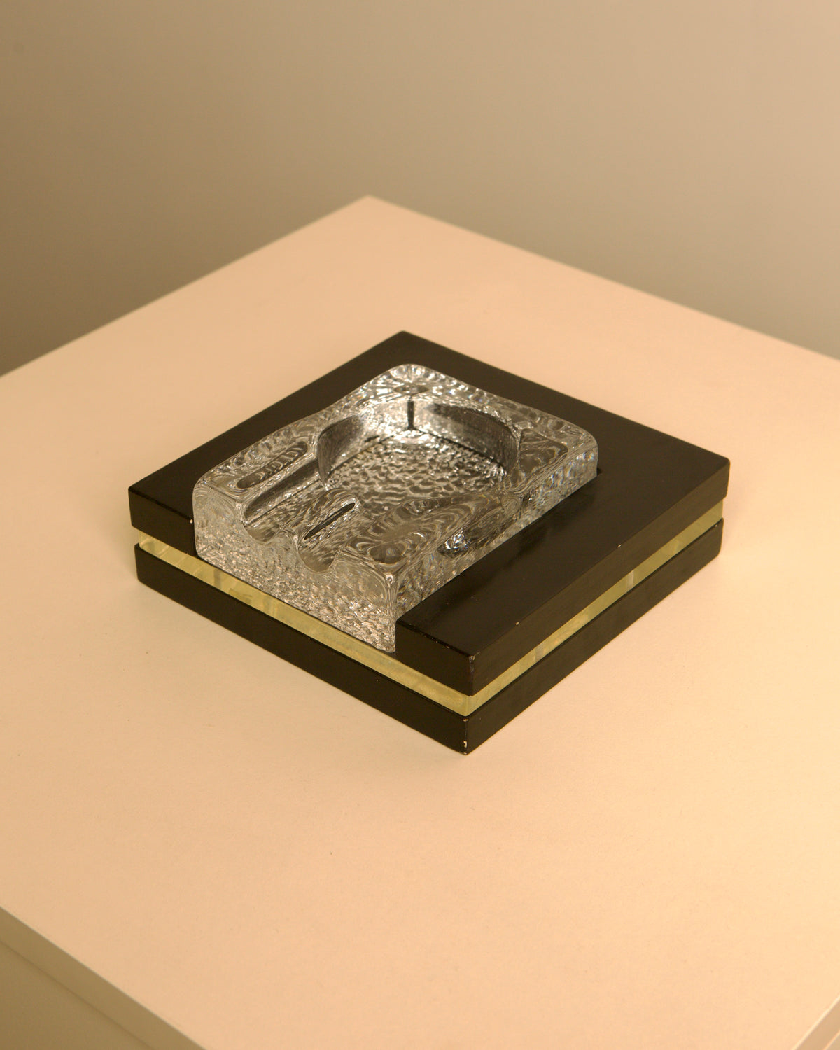 Italy, 1960s. Rolled brass, worked flat with an almost architectural rigour, marks a momen — side angle