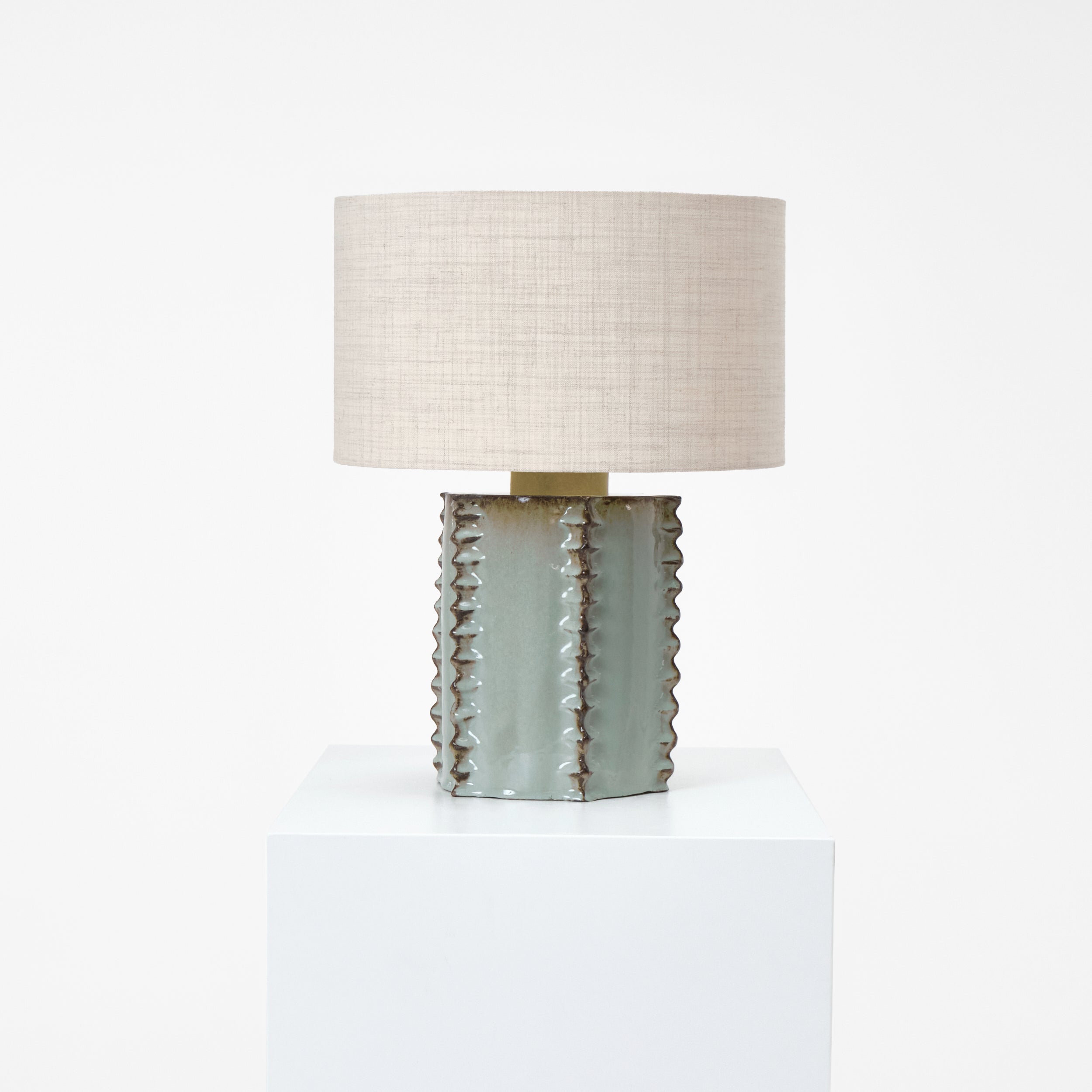 Totem Table Light — angled view of textured ceramic base