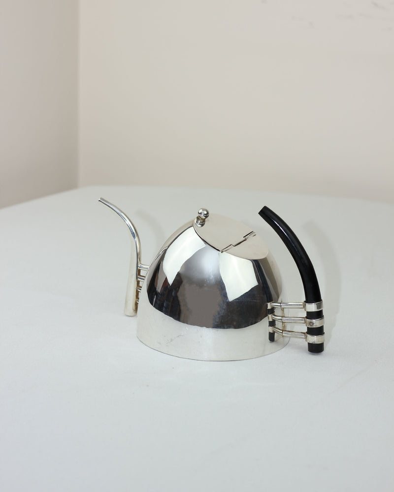 Lino Sabattini Teapot 80s — close-up of polished silver surface