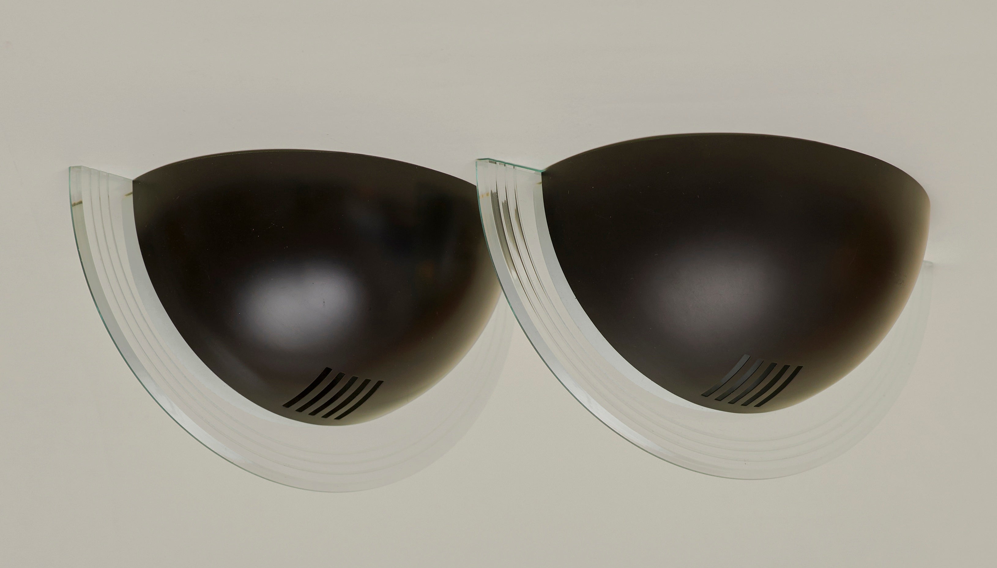 Set of 2 Vintage German Postmodern Wall Lights Circa 1980 — angled view showing black and glass design