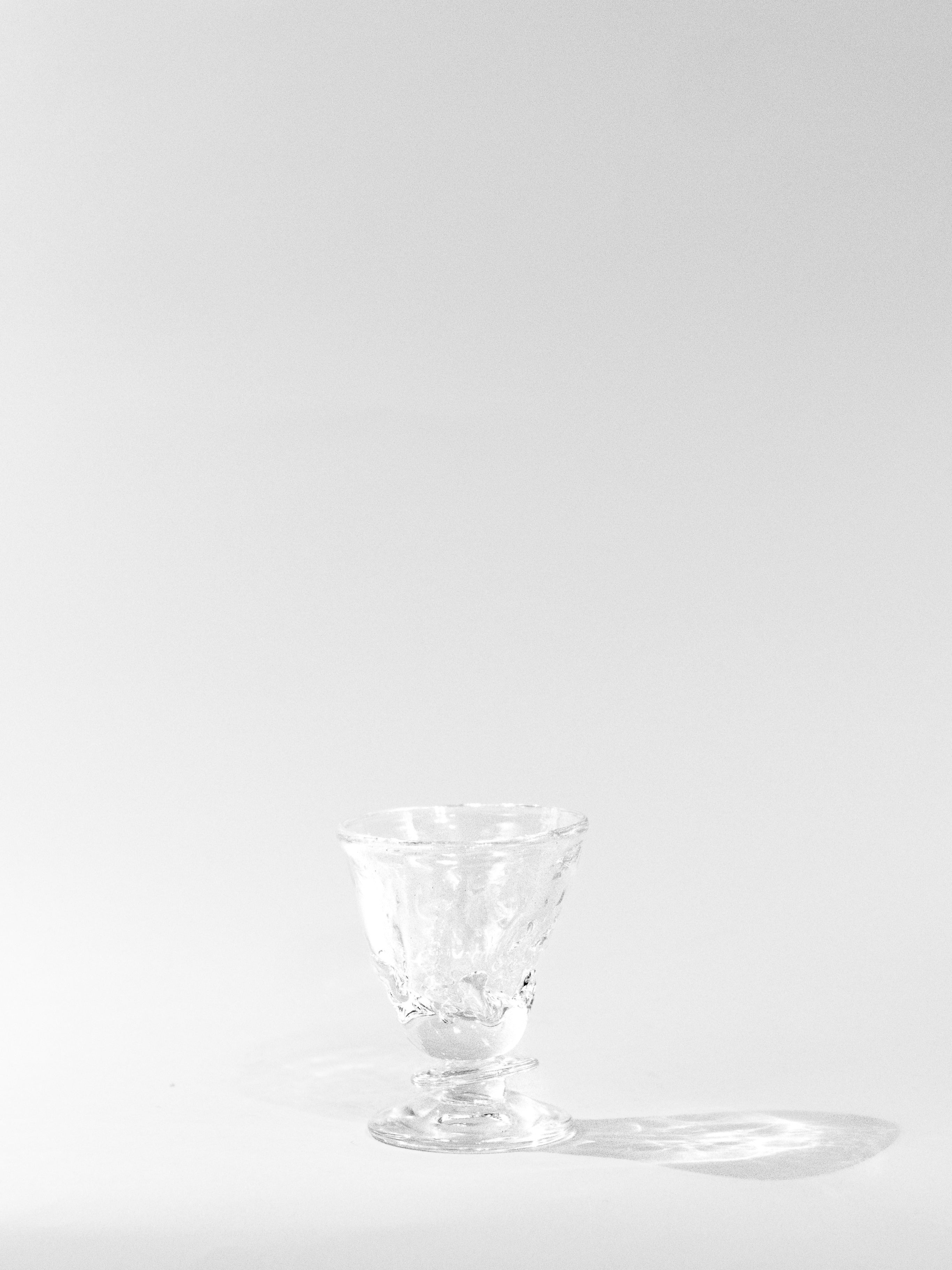 Blown Free-shaped Glass — back view on white background