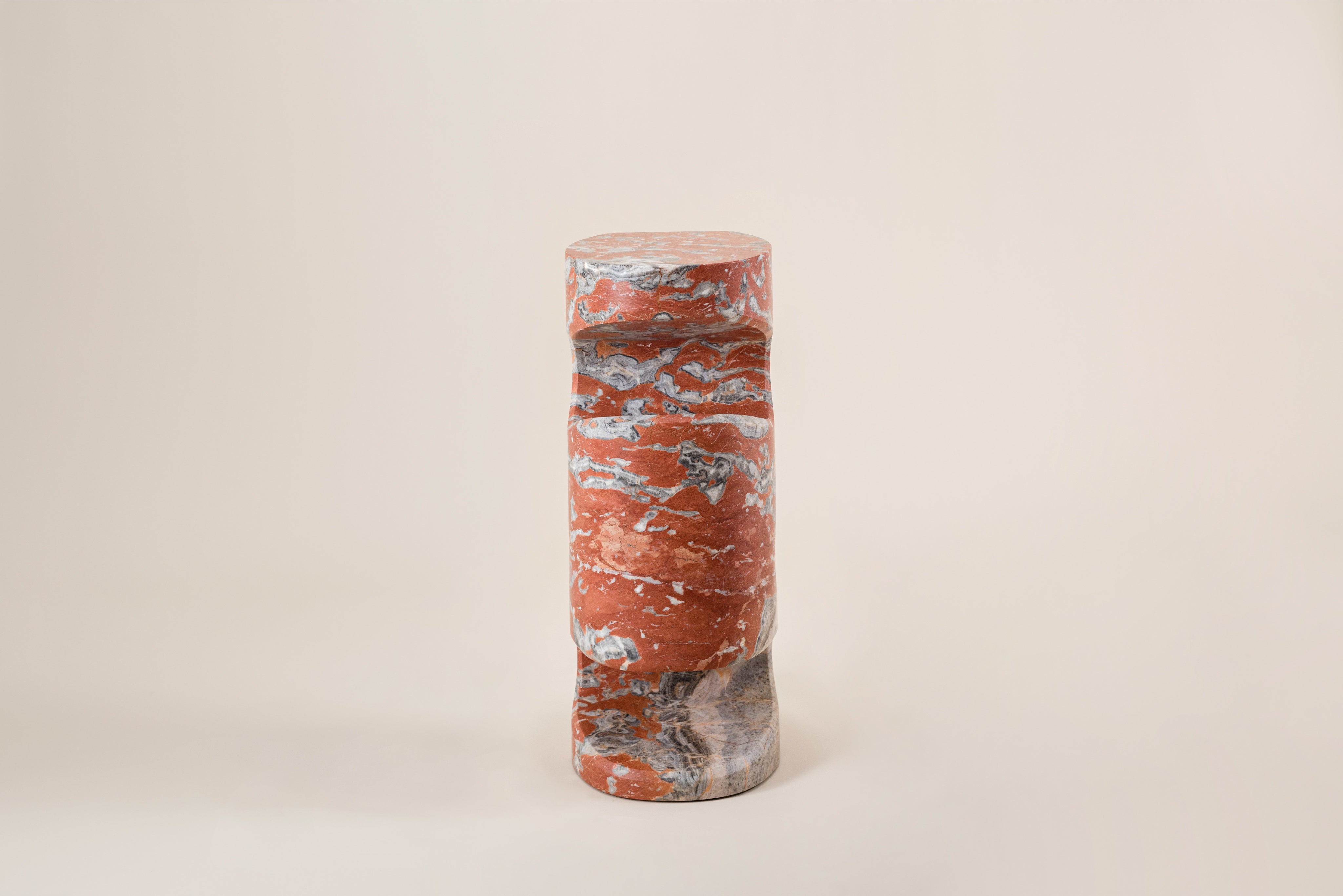 Tobo Side Table — close-up of red and gray marble texture