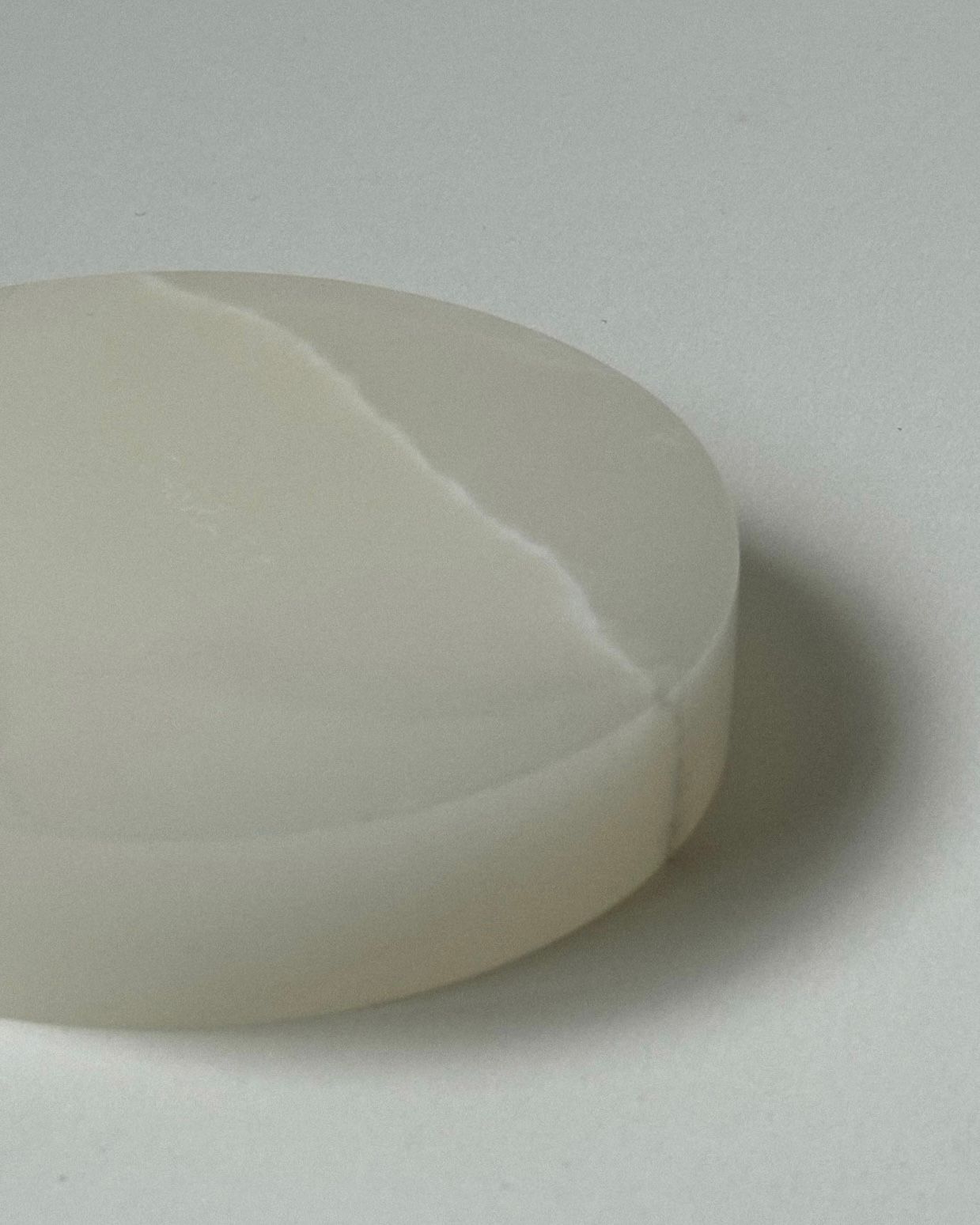 ALTAR' incense holder — close-up of smooth white surface