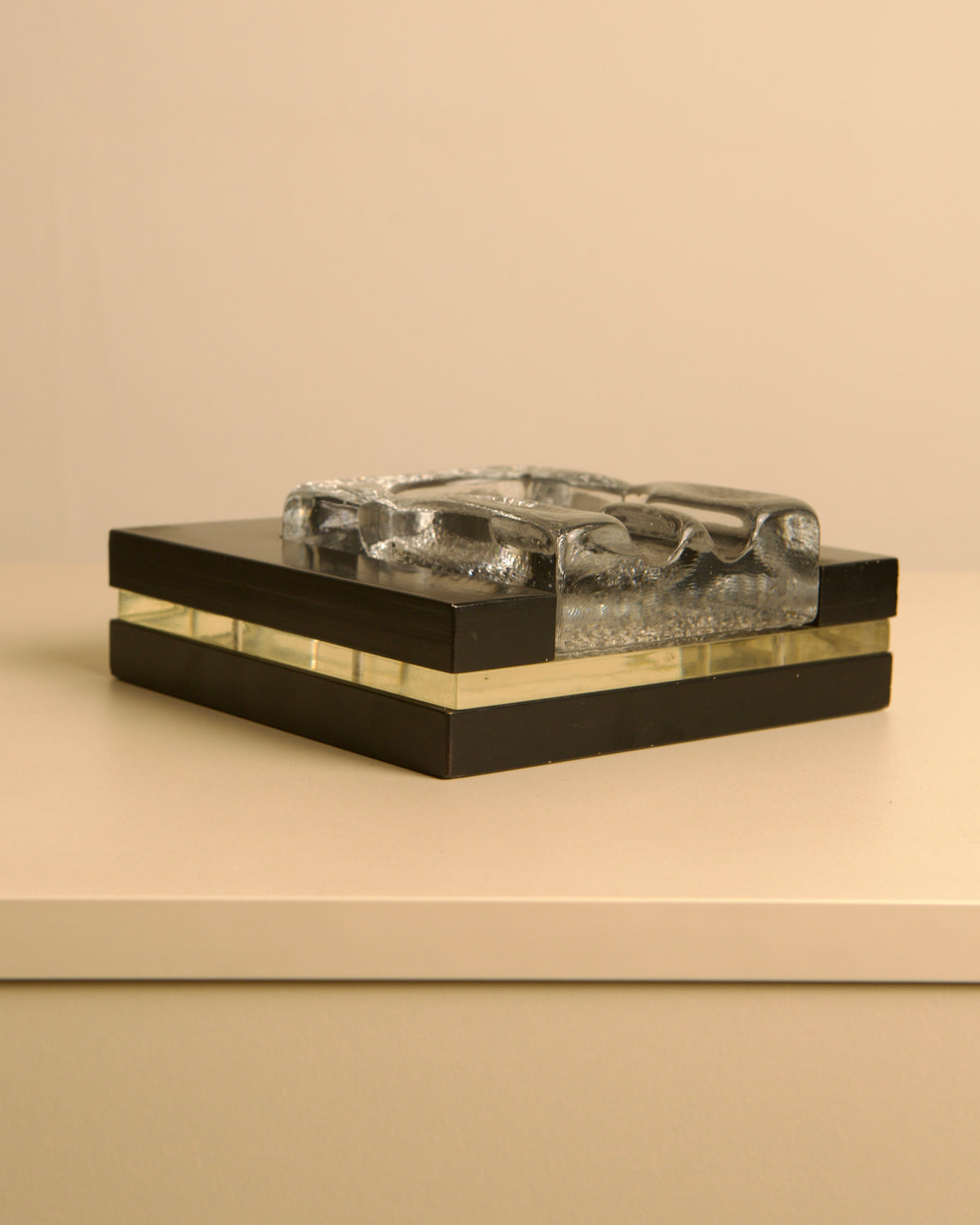 Italy, 1960s. Rolled brass, worked flat with an almost architectural rigour, marks a momen — lifestyle setting