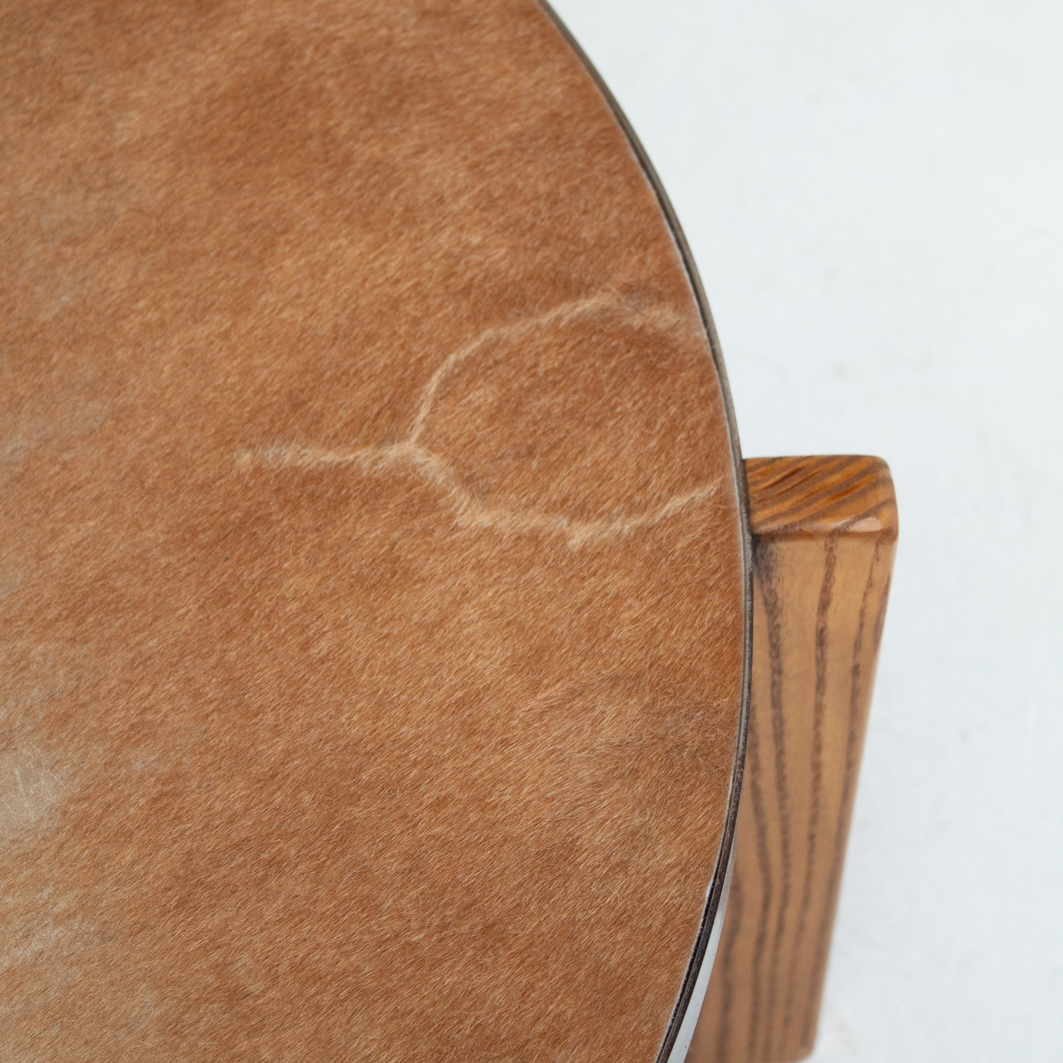 2 Coffee Tables in Wood and Cowhide — top view of cowhide surface