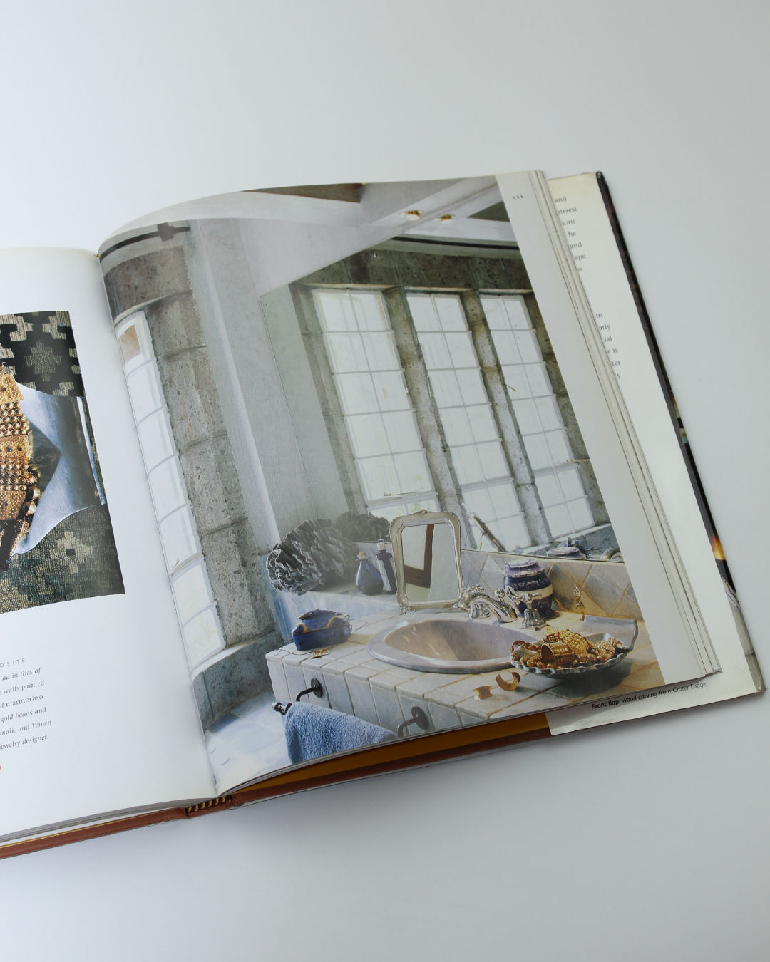 Safari Style' Book — back view showing open pages on marble countertop