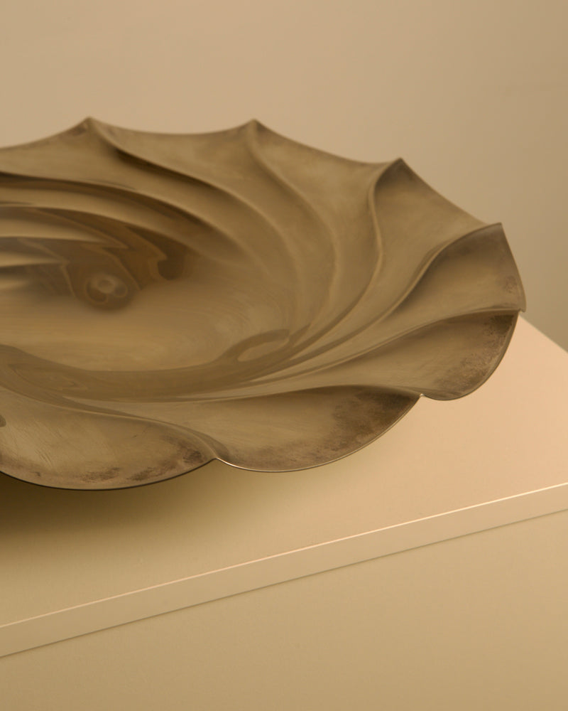 Large Italian Silver-plated Metal Vide-poches — close-up of wavy metallic surface