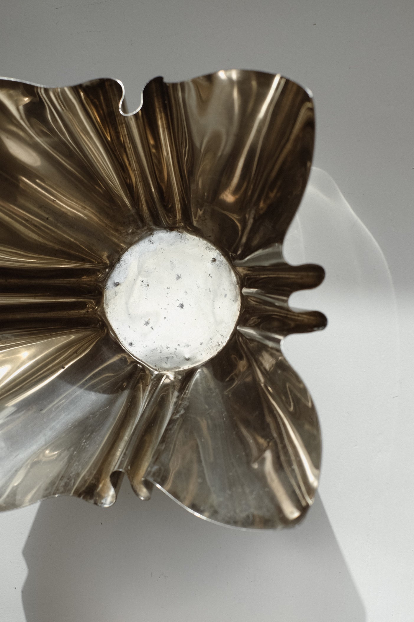 Folded Chrome Bowl — top view highlighting reflective chrome surface