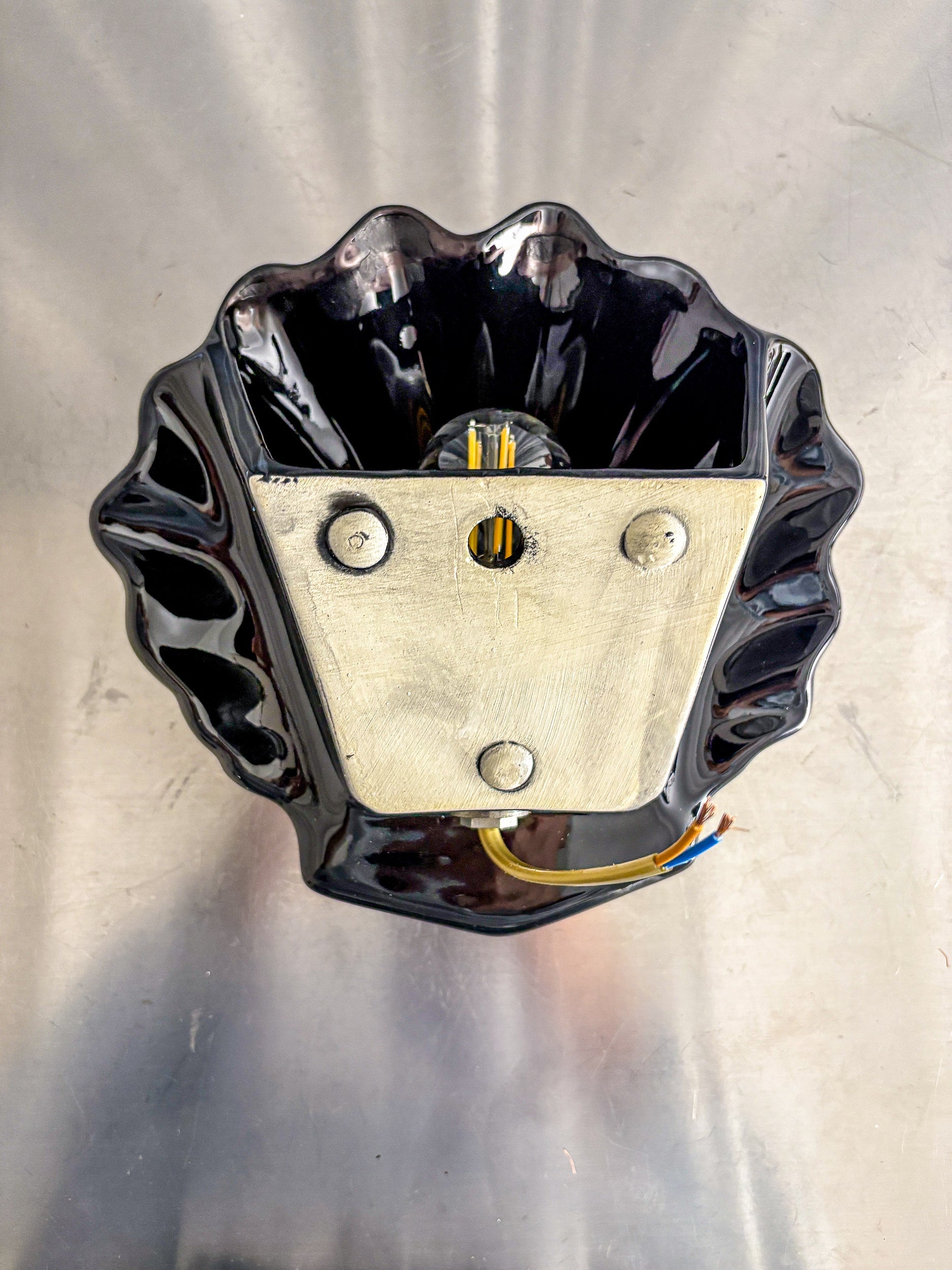 Italian shell-shaped wall sconce, black ceramic, 1970's — in context