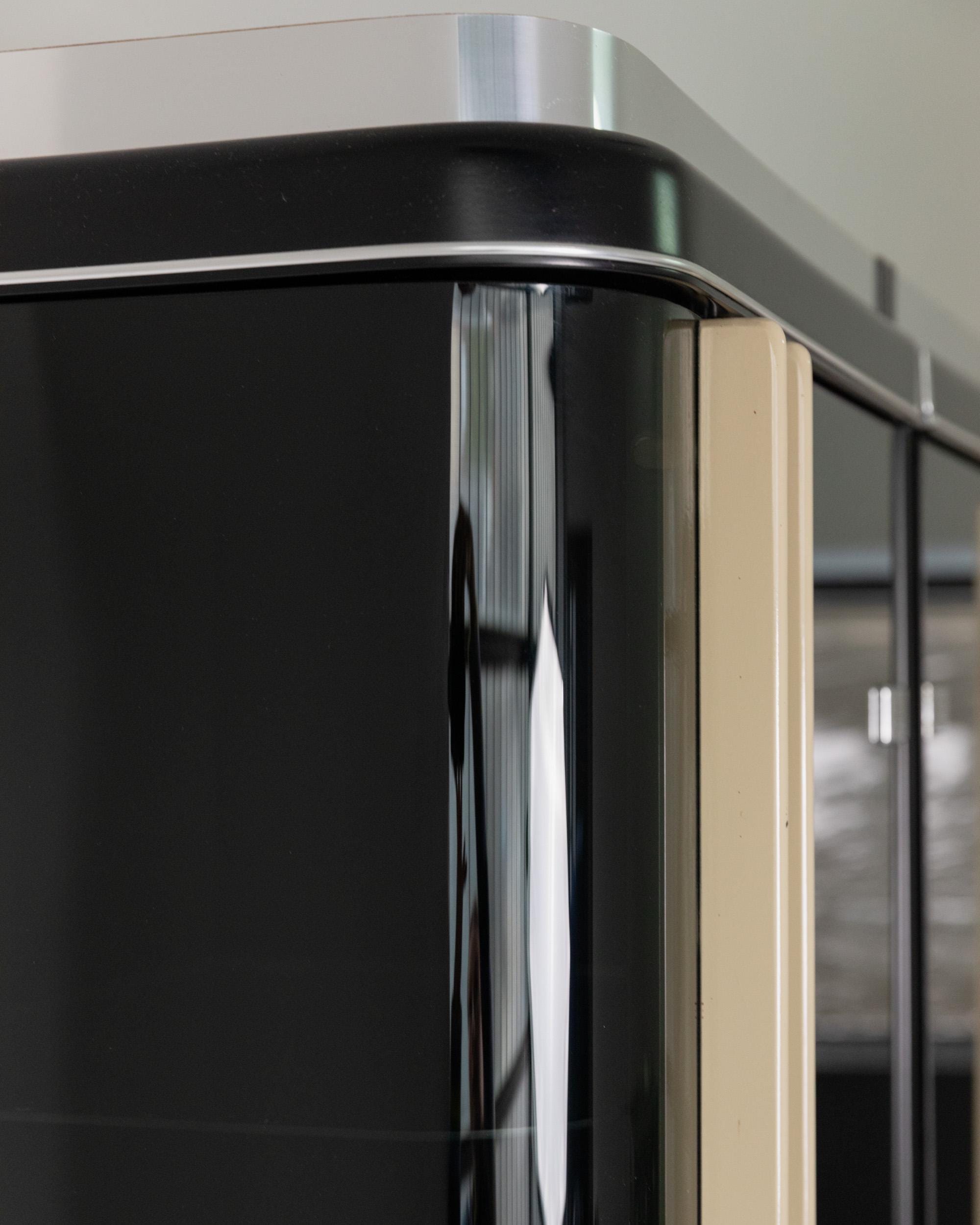 1950s Art Deco Bar Cabinet in Lacquered Wood — close-up of glossy black finish