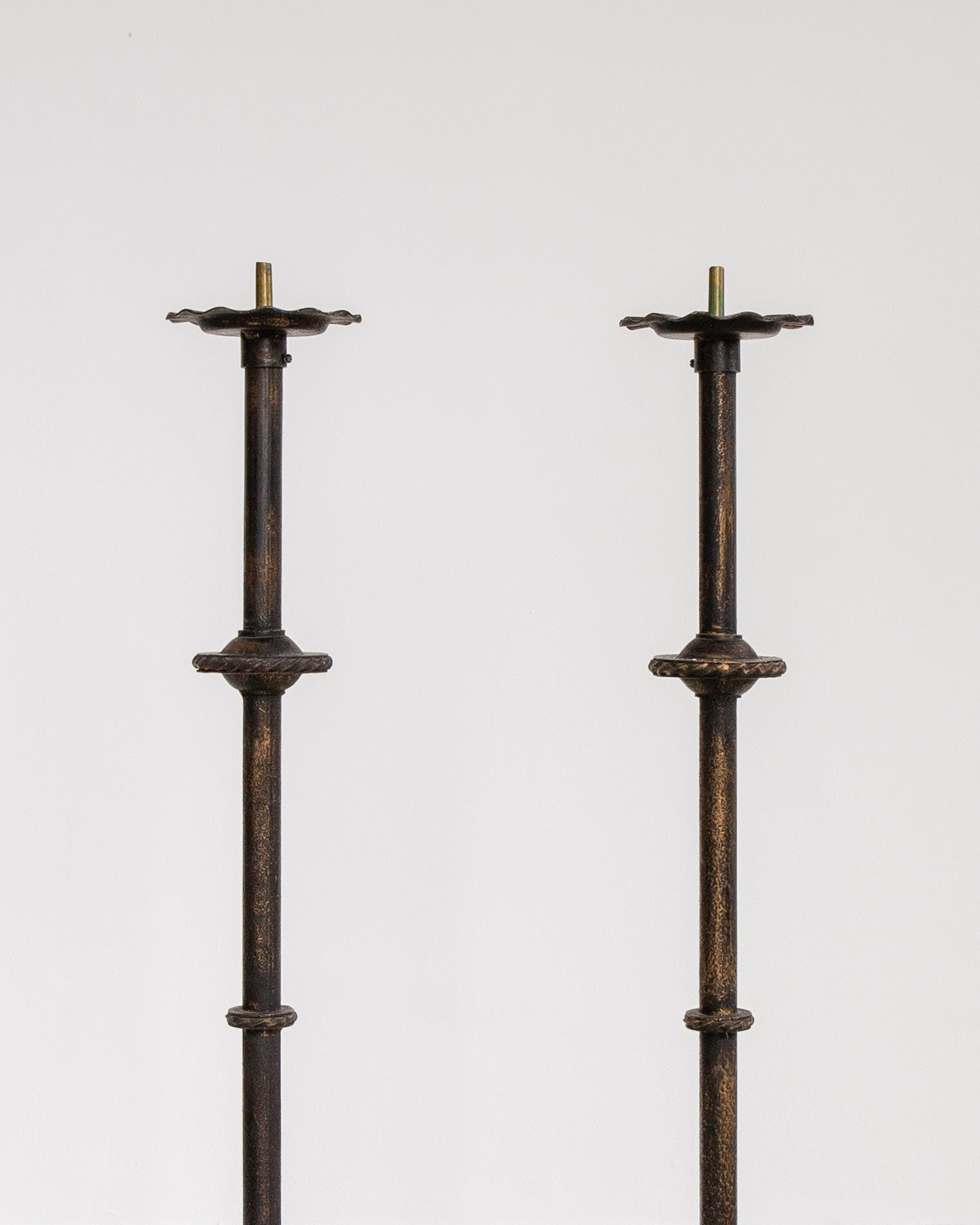 Pair of Monumental Cast Iron Floor Candleholders by Böhlmarks, Sweden, 1930s — back view highlighting textured iron finish