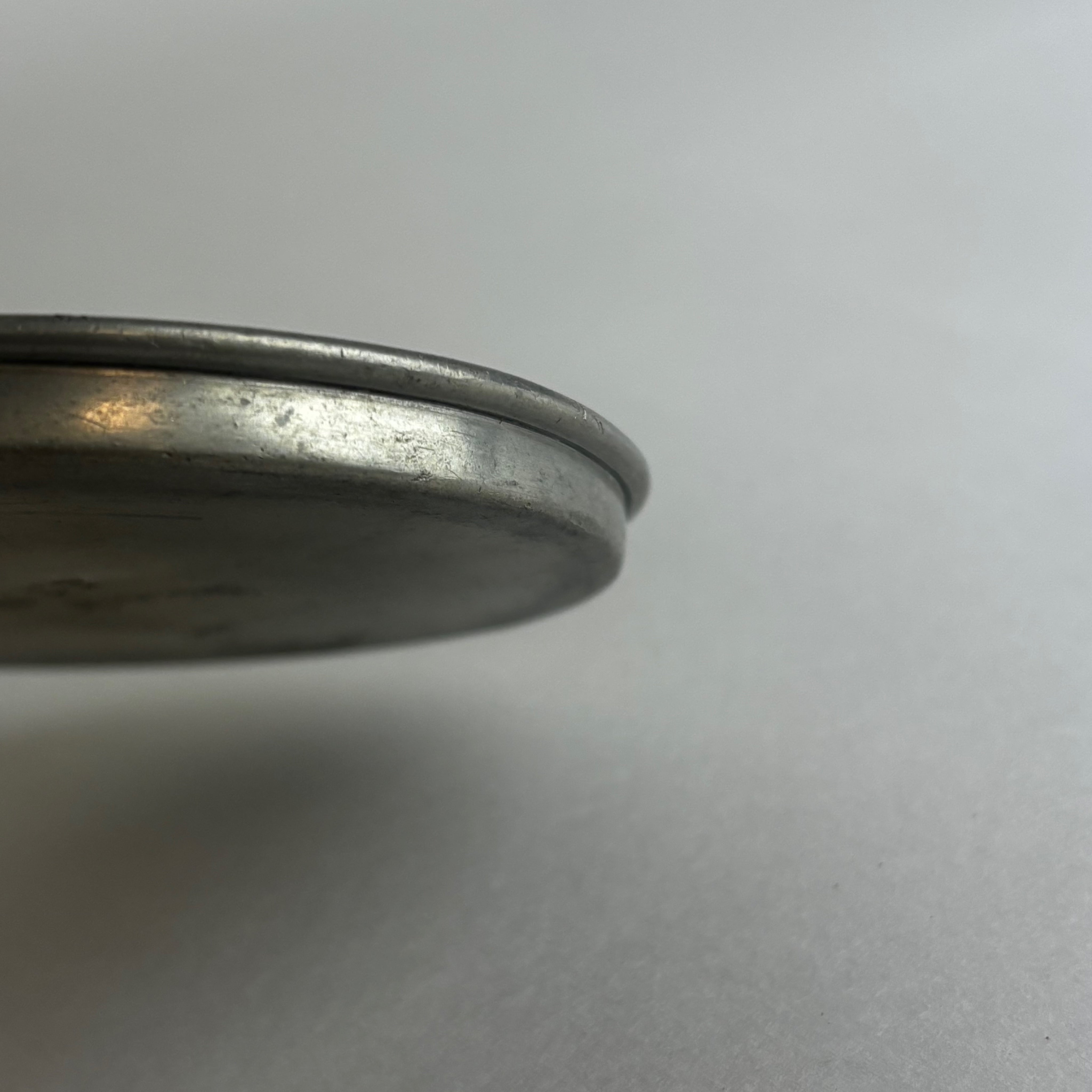 Anna Petrus, Svenkst Stenn, Pewter Dish w/ Leger Figure — side angle