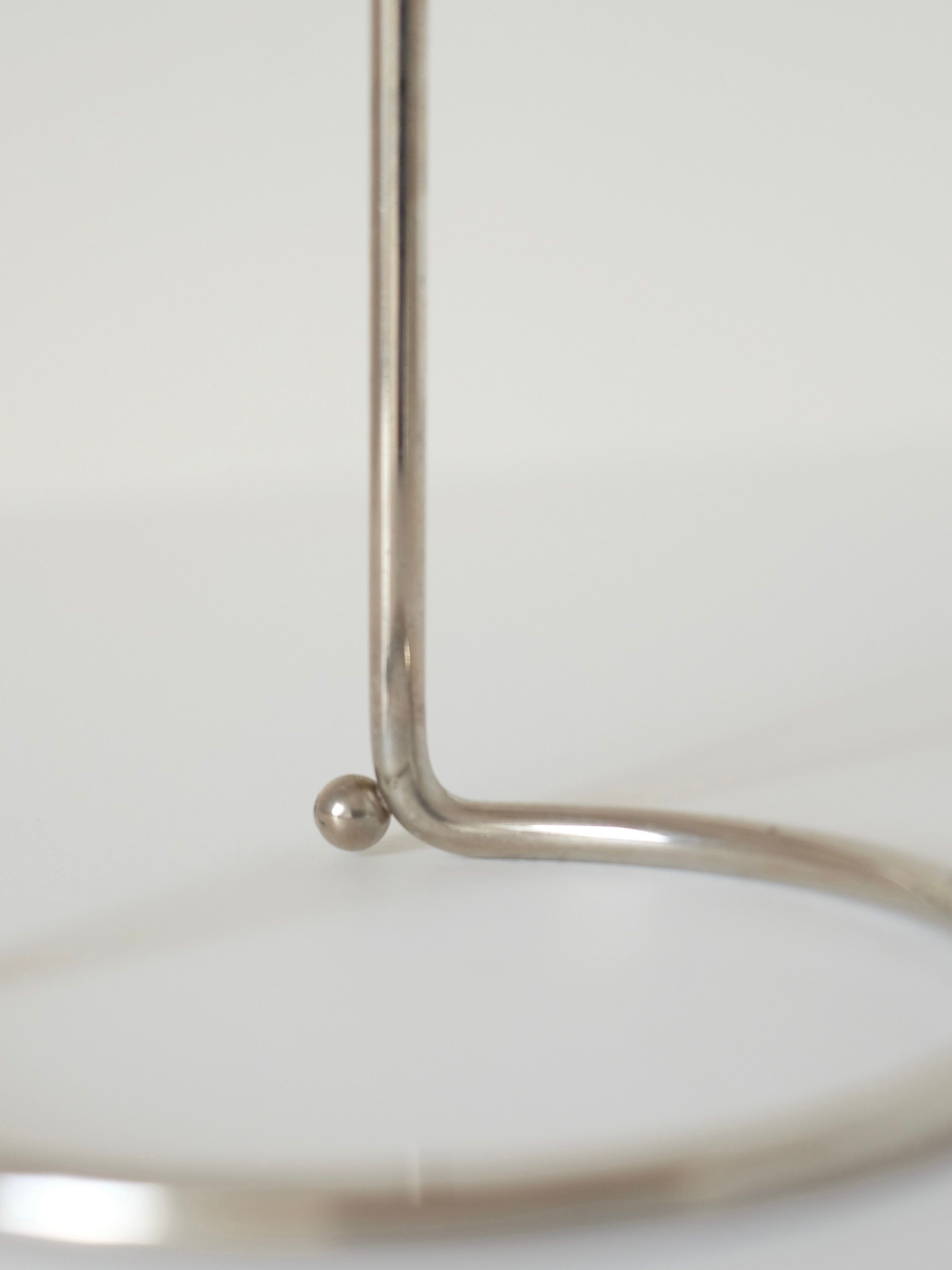 WMF Candle Holder — back view highlighting metal structure and base